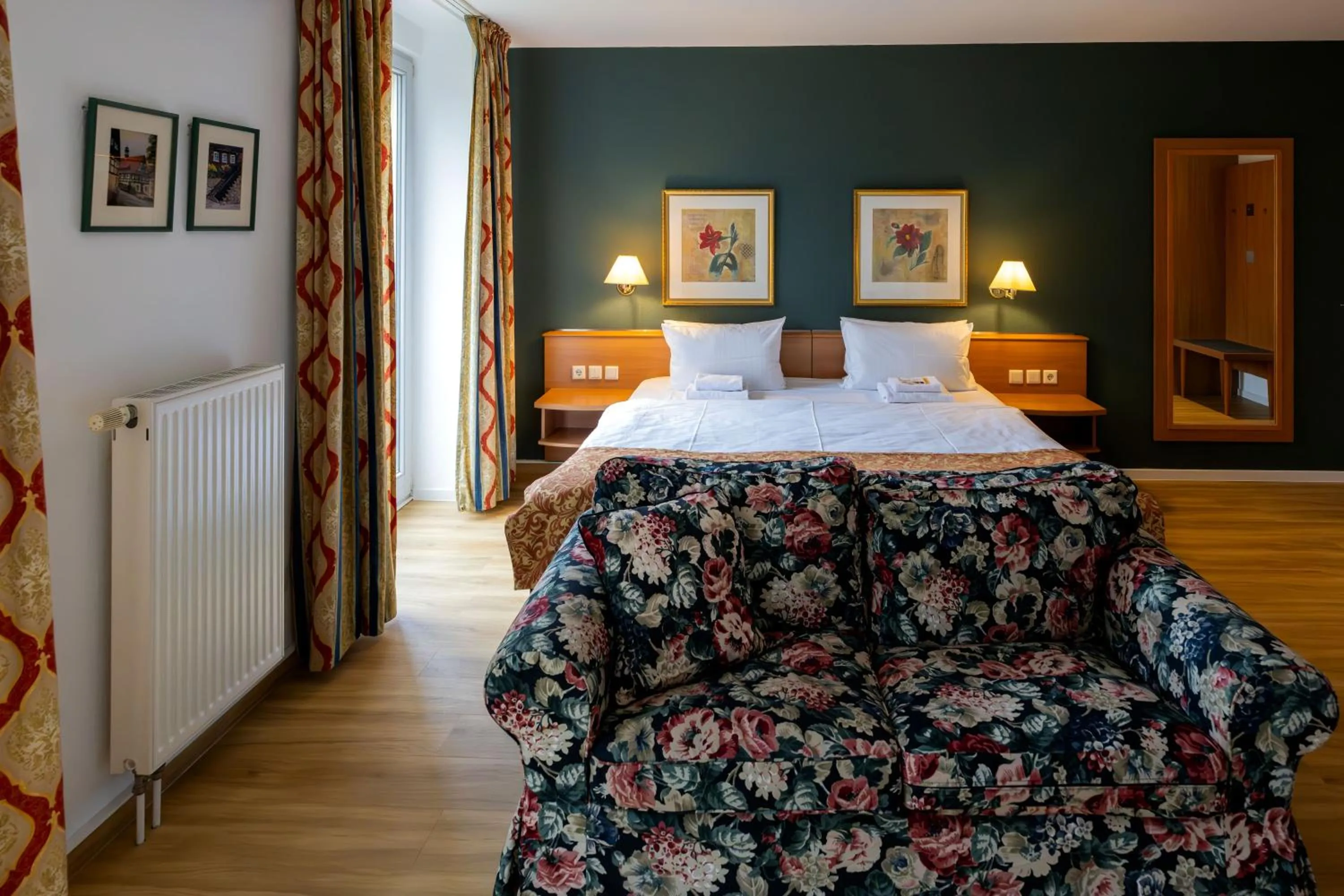 Photo of the whole room, Bed in Parkhotel Hohnstein by STEIGER Hotels