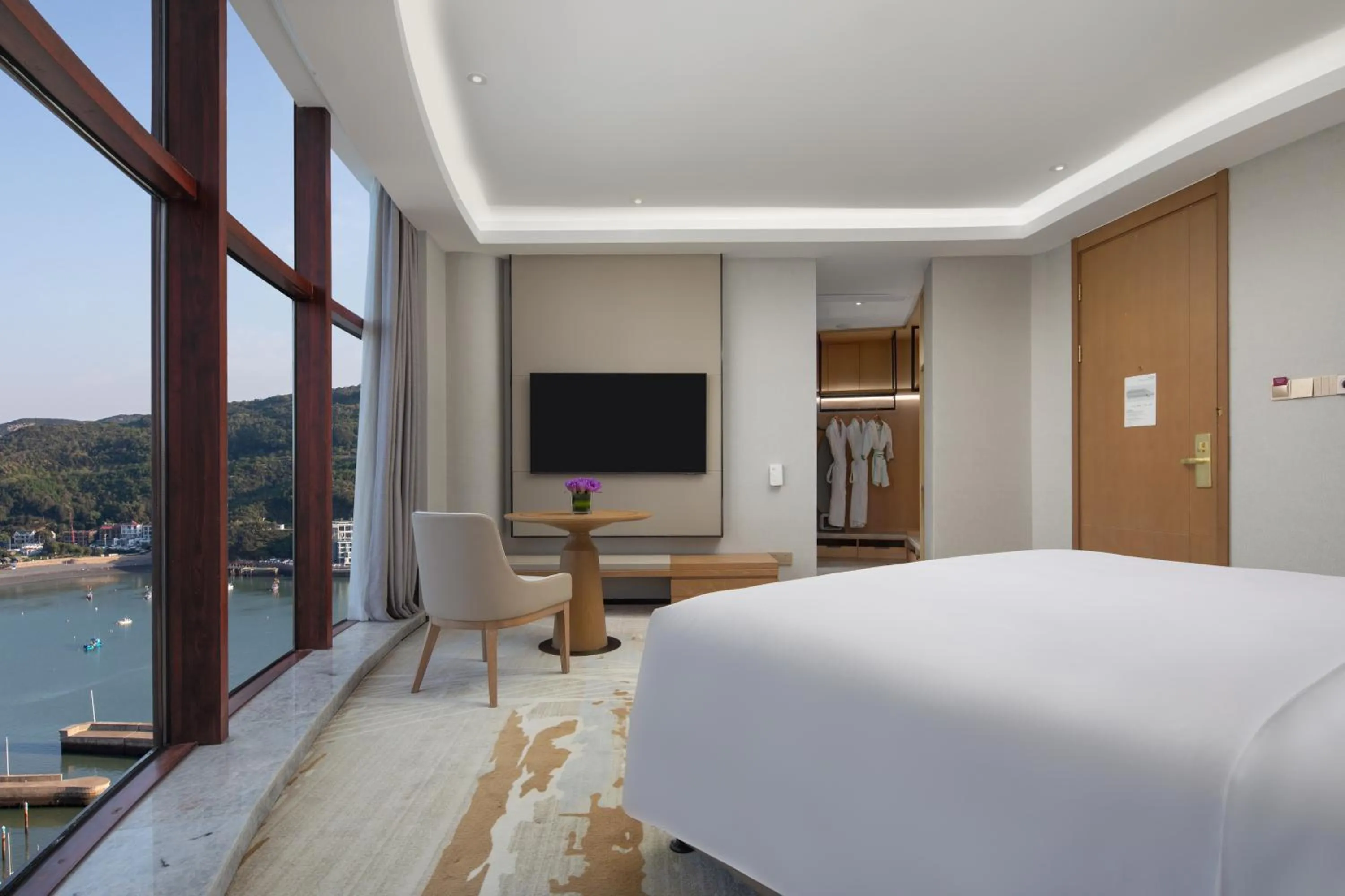 Natural landscape, Bed in Crowne Plaza Zhoushan Seaview by IHG