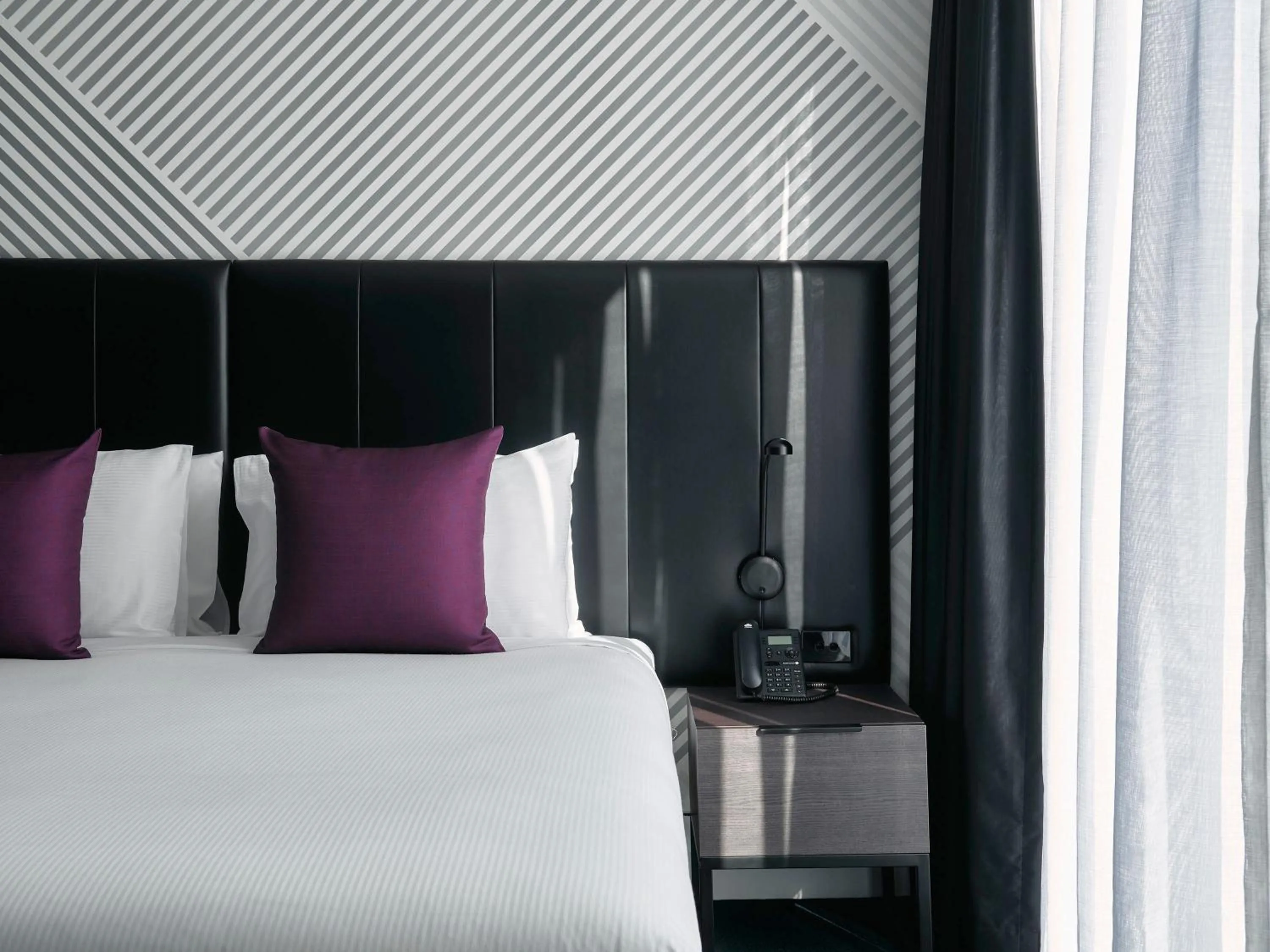 Bed in Movenpick Hotel Melbourne On Spencer