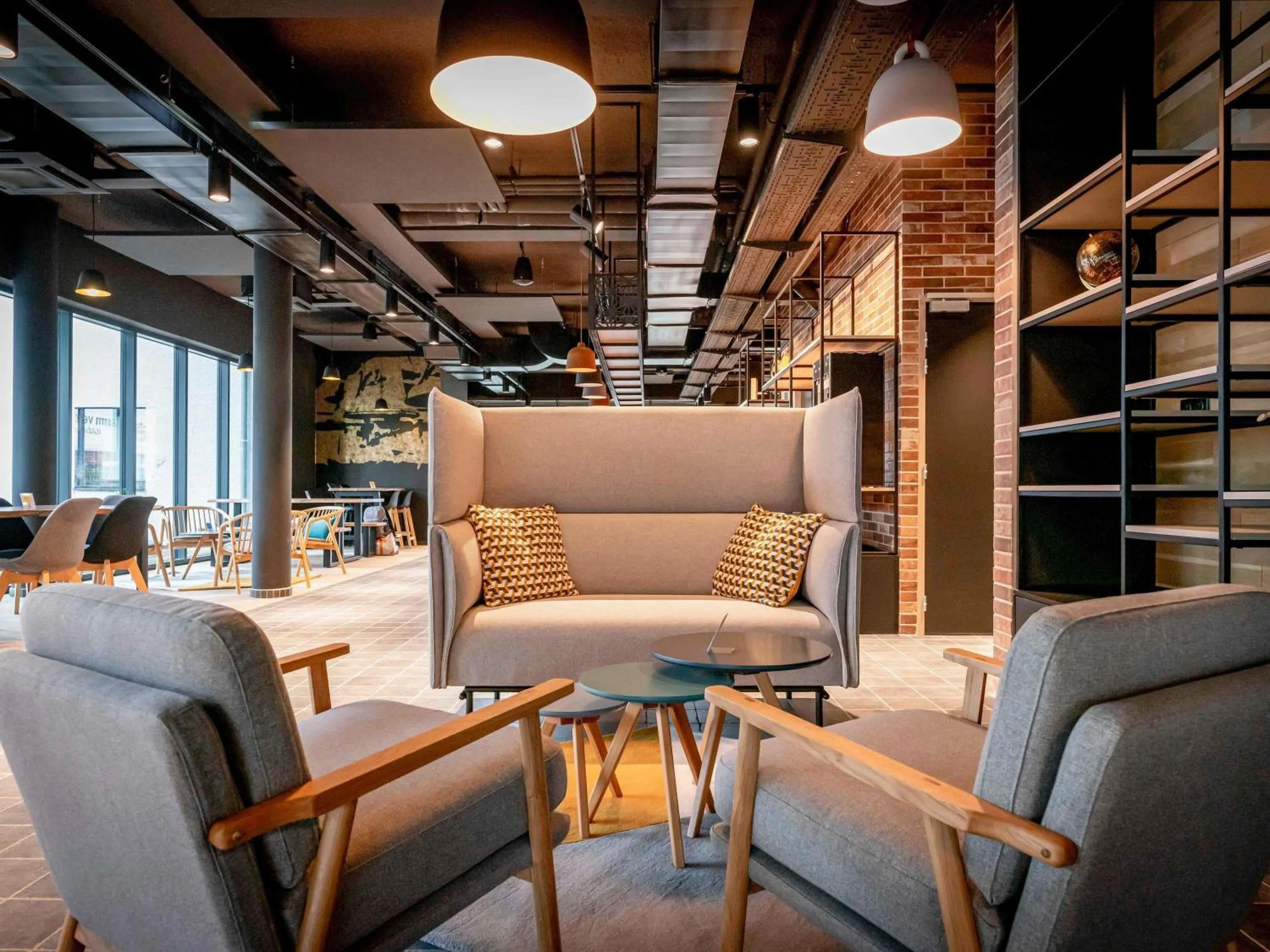 Lounge or bar in ibis Styles Valenciennes Petite Foret