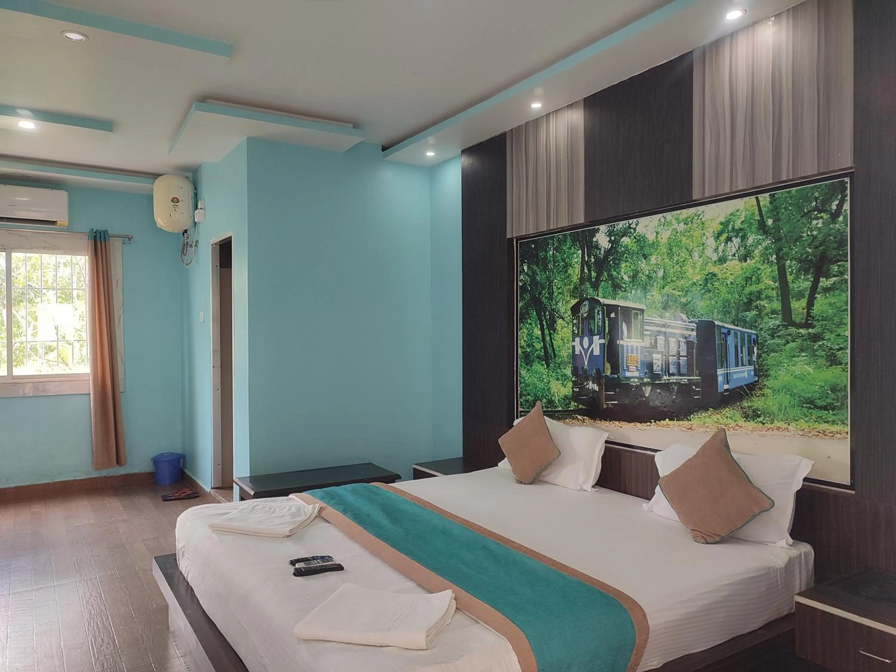 Communal lounge/ TV room, Bed in Maa Greenary View - A Holiday Resort