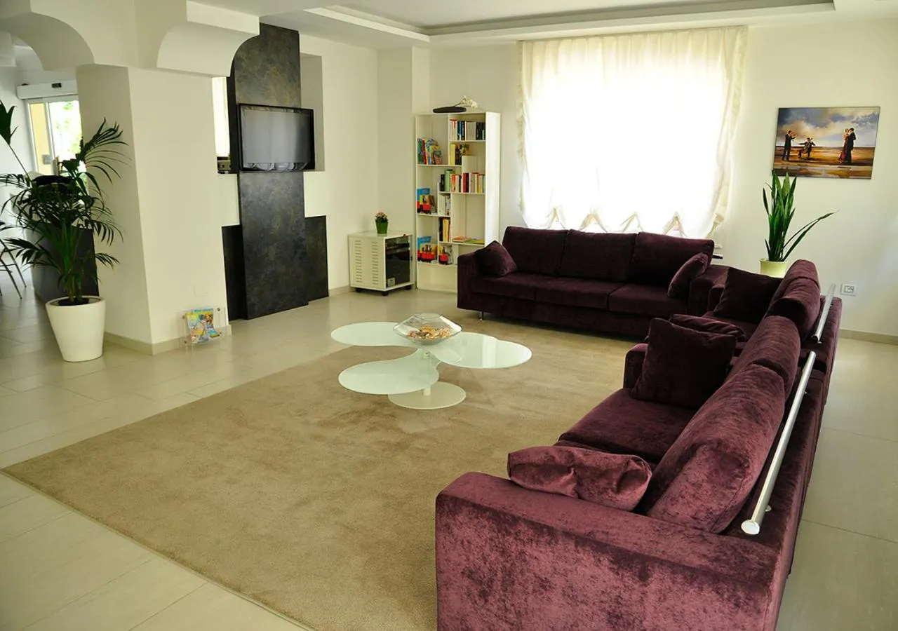 Communal lounge/ TV room in Hotel Lugano