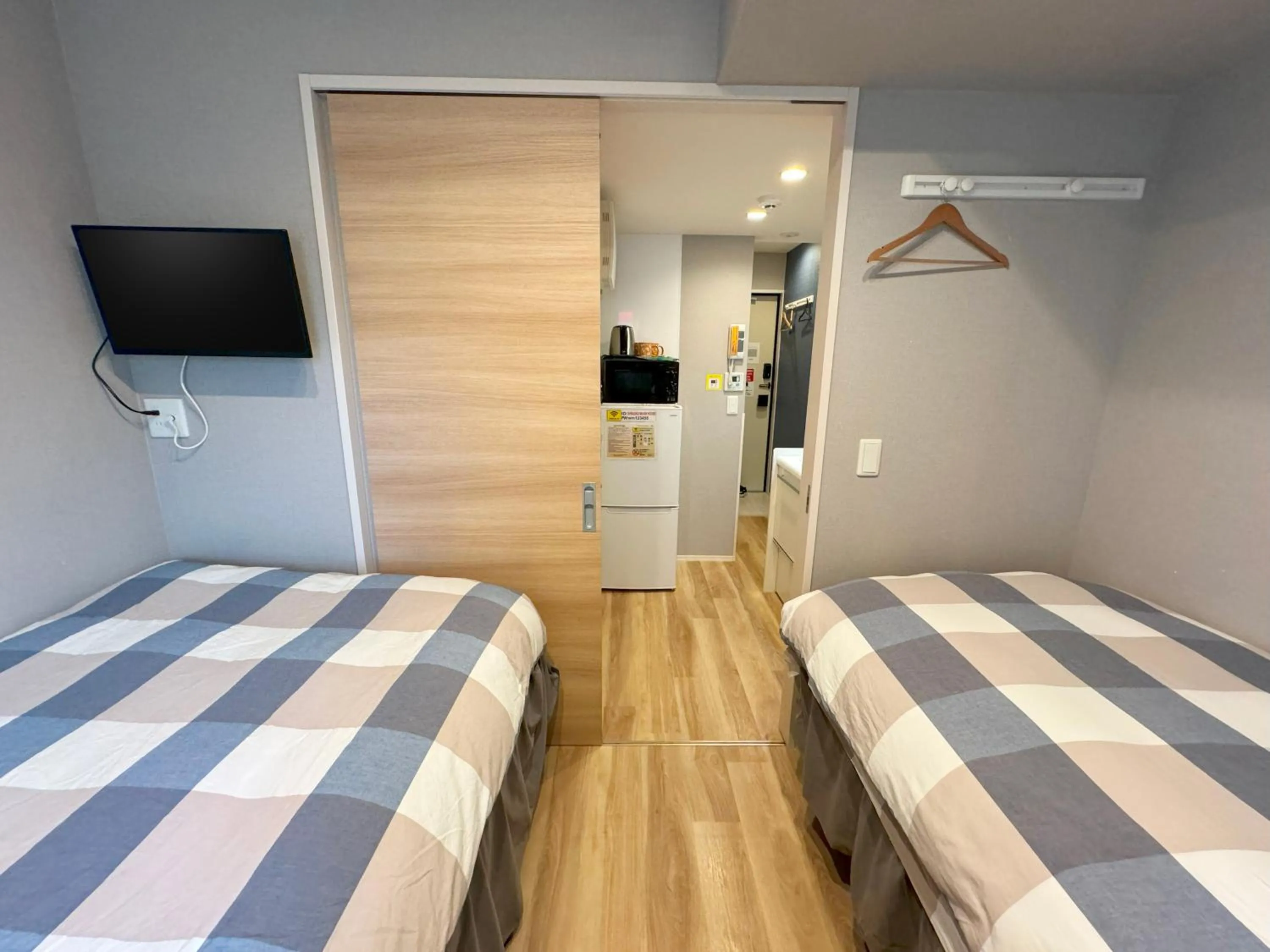 Bed in SHINJUKU WARM HOUSE