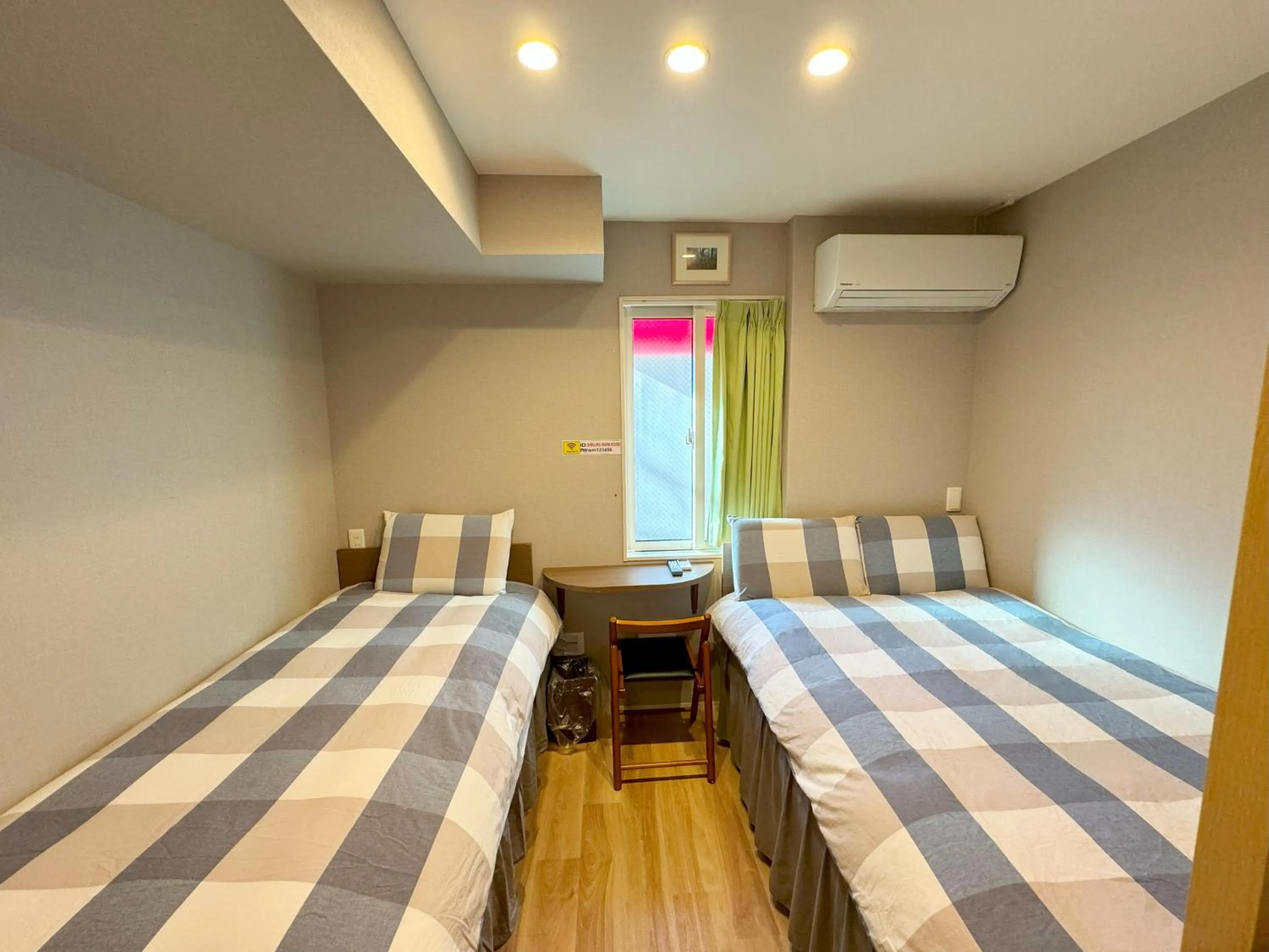 Bed in SHINJUKU WARM HOUSE