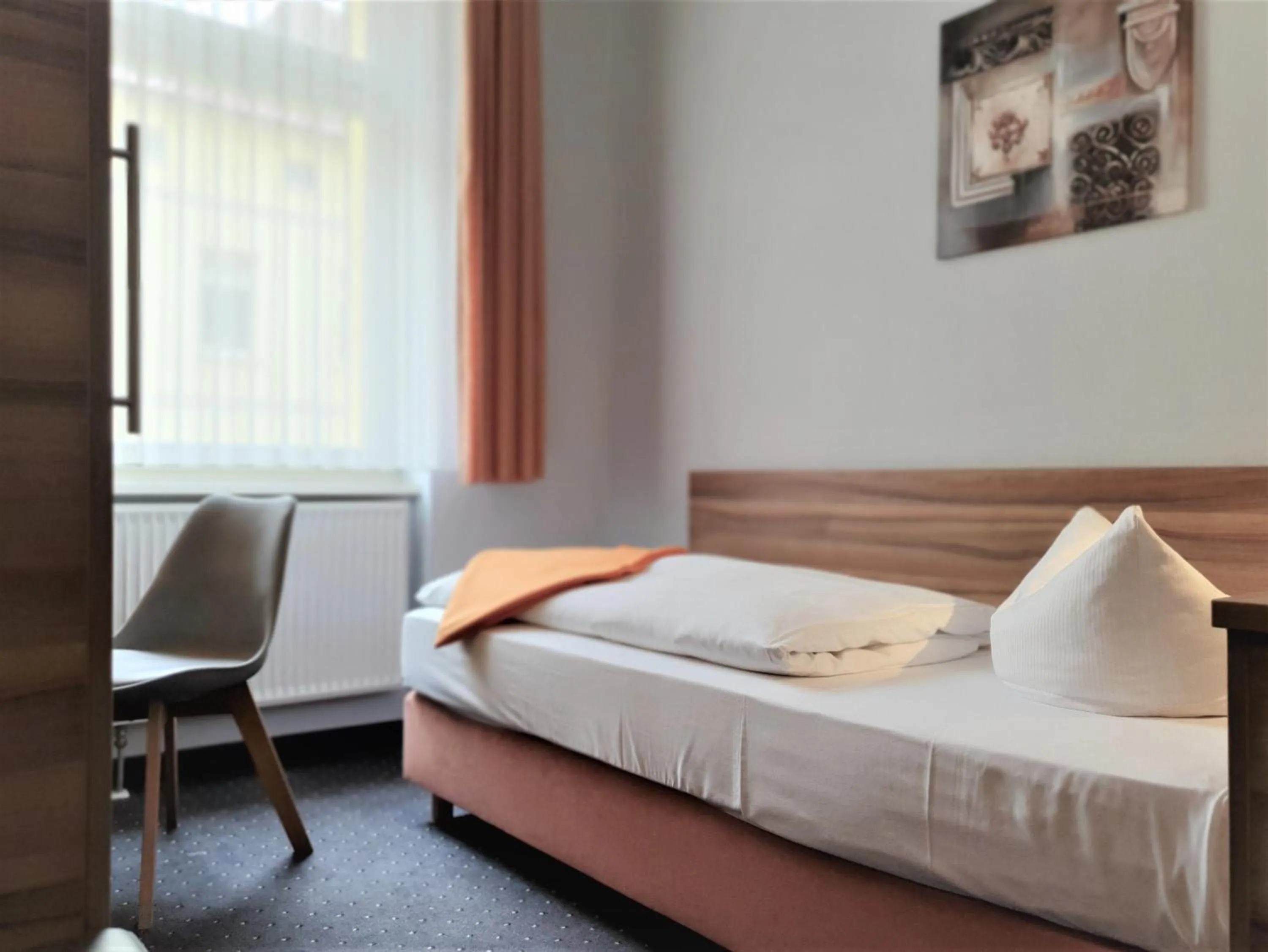 Bed in Melarose Feng Shui Hotel