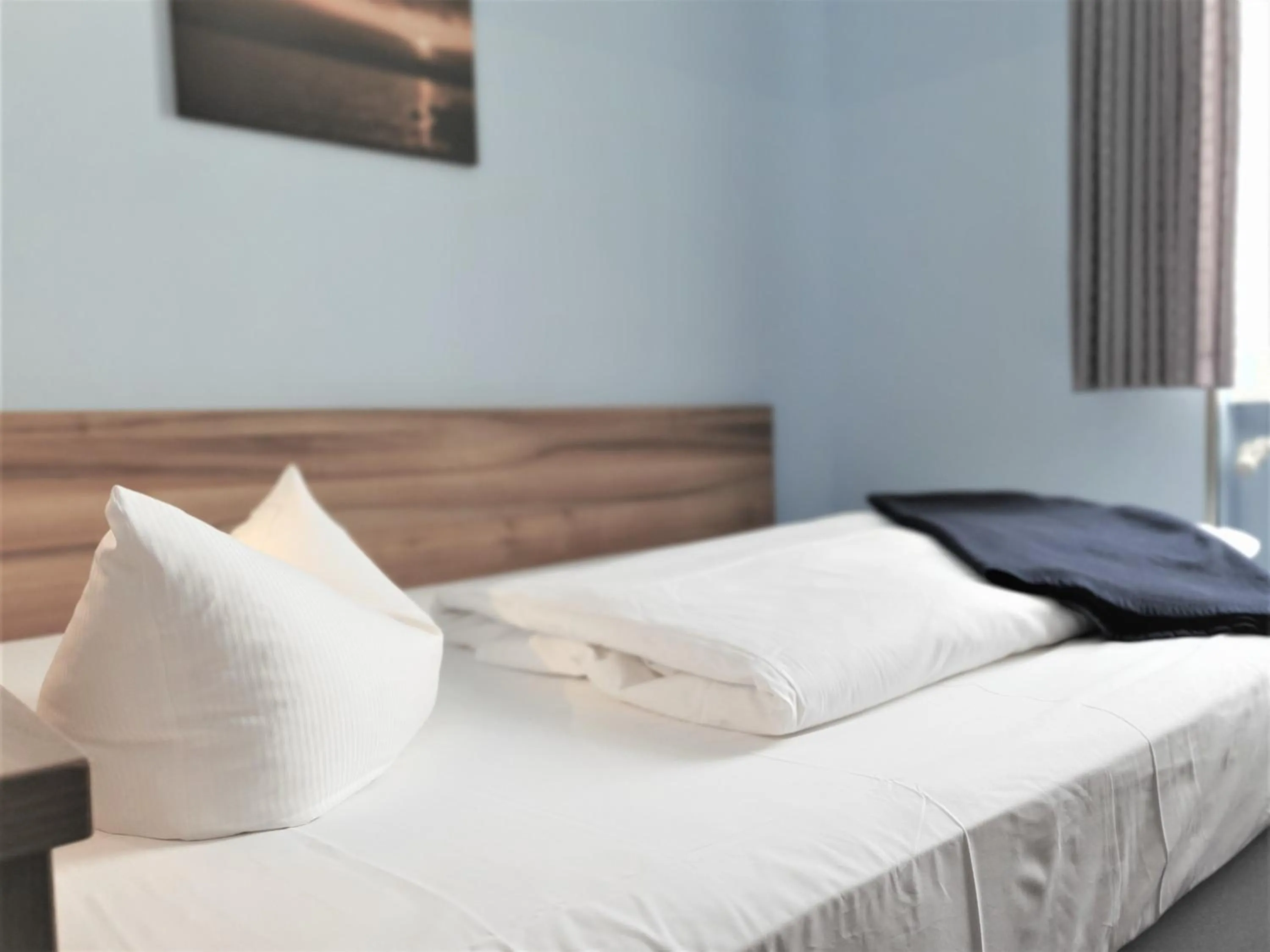 Bed in Melarose Feng Shui Hotel