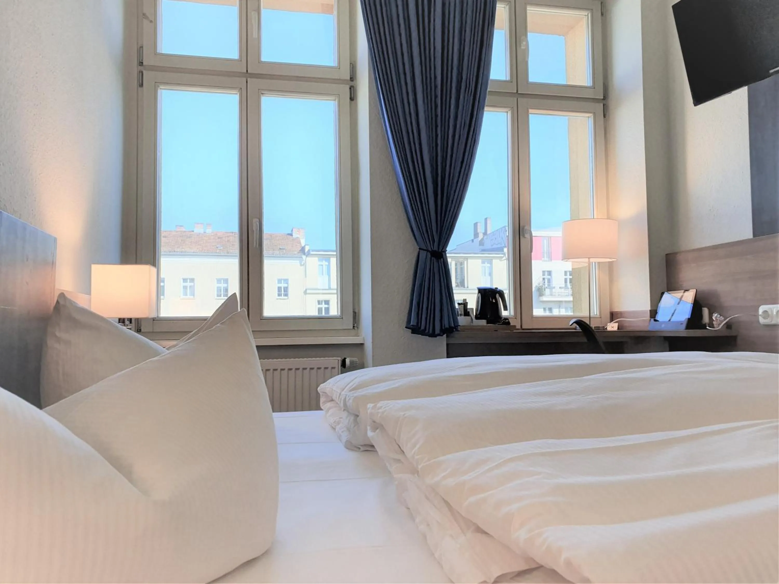 Bed in Melarose Feng Shui Hotel