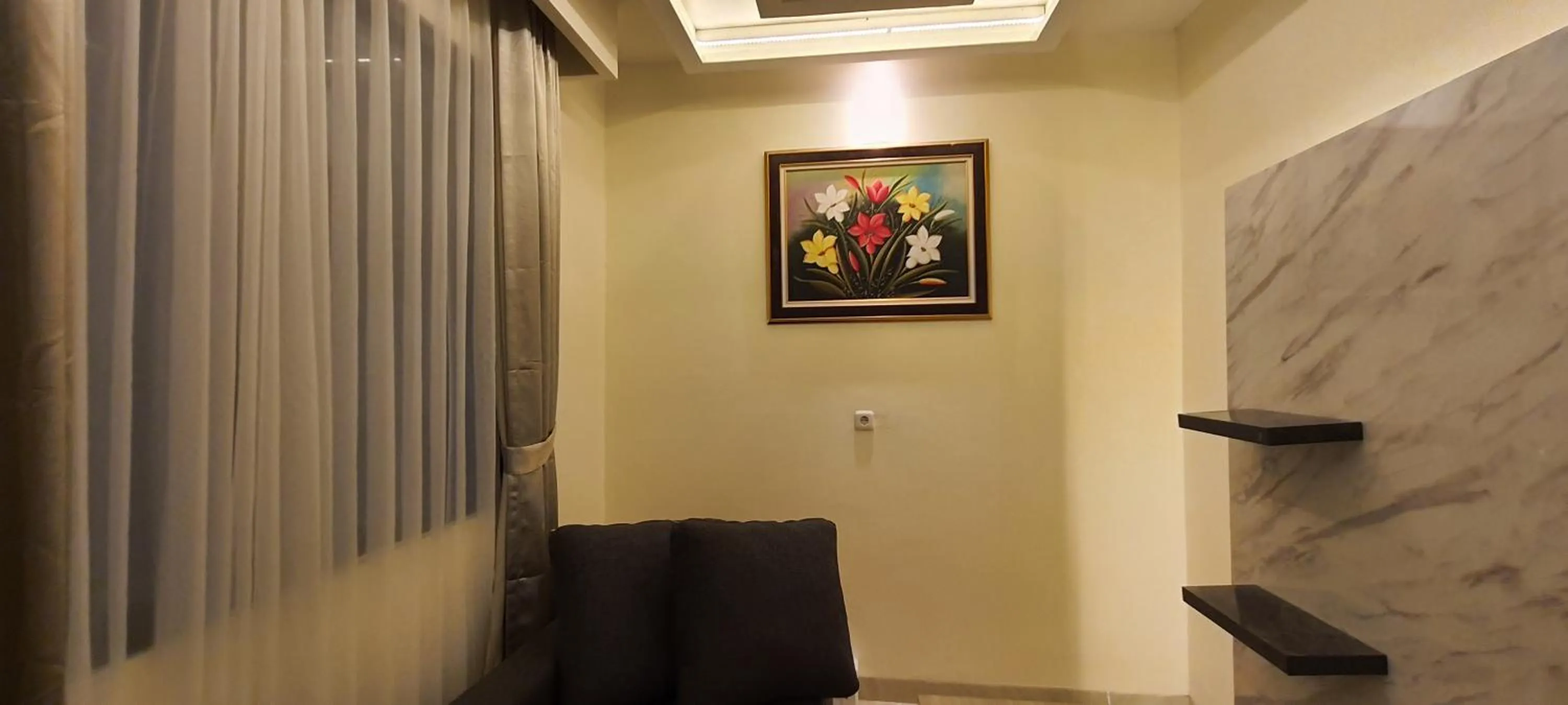 Living room in Hotel Daily Inn Bandung