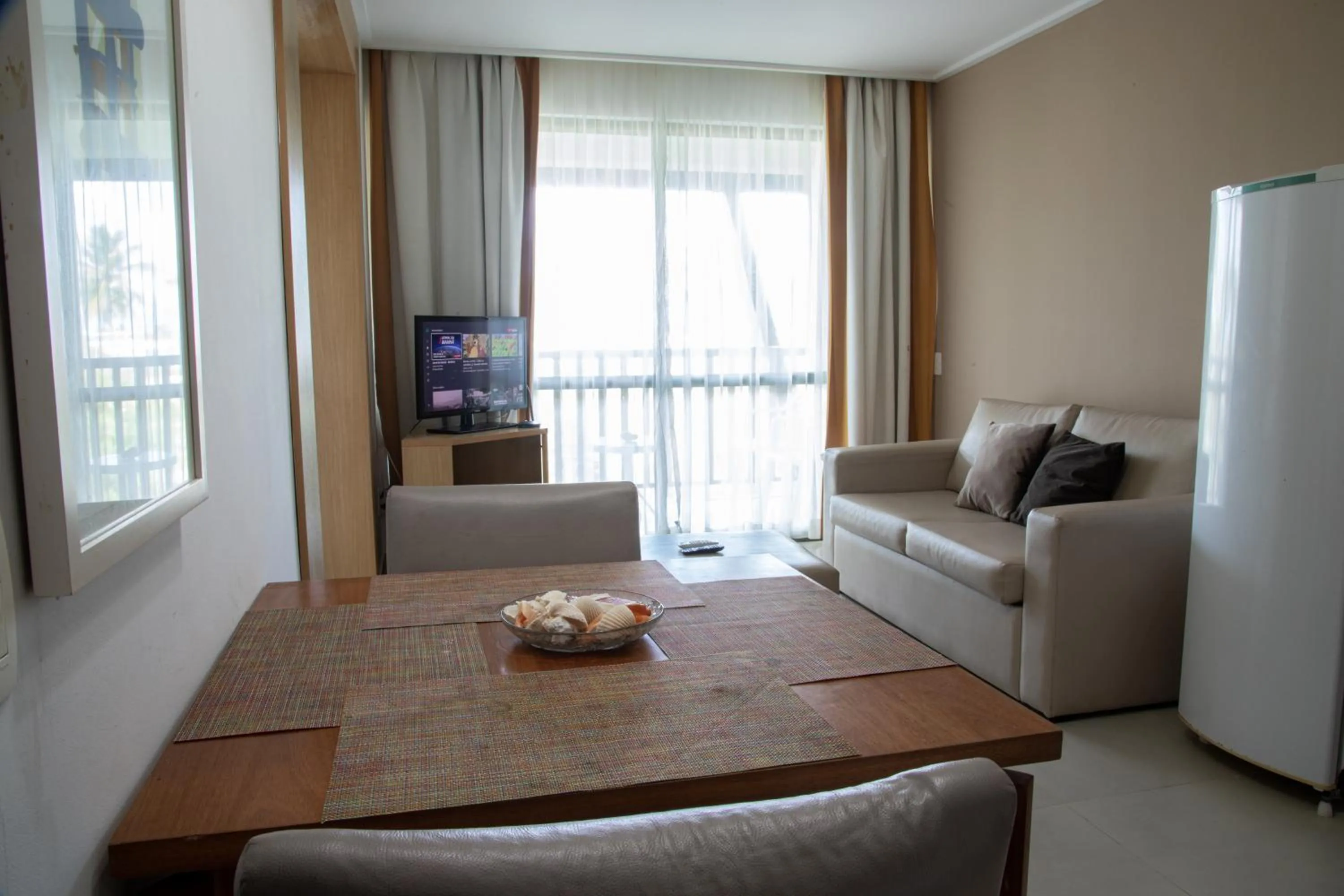 Living room in Beach Class Muro Alto Condomínio Resort By New Time