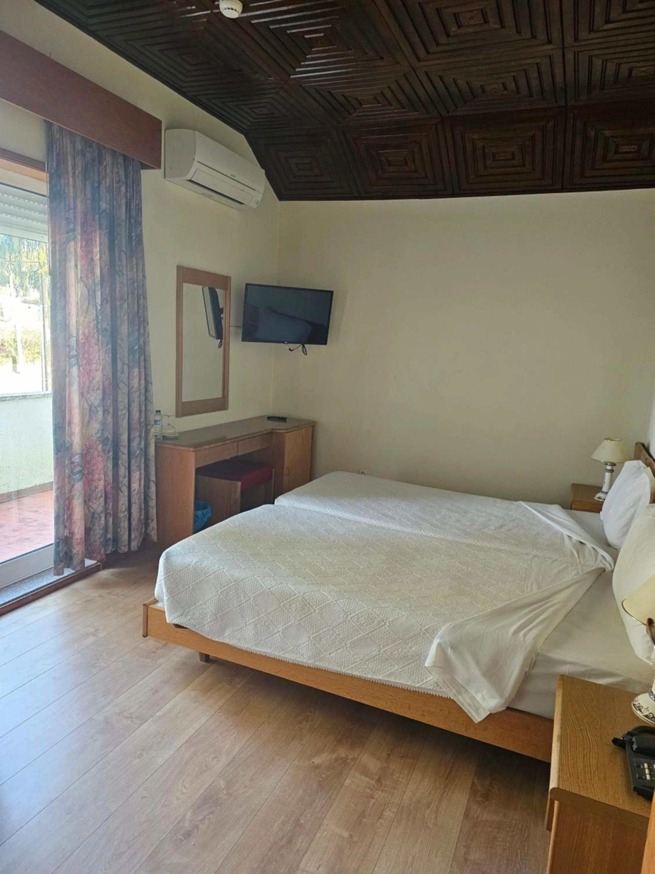 Bed in HOTEL CRUZ DA MATA