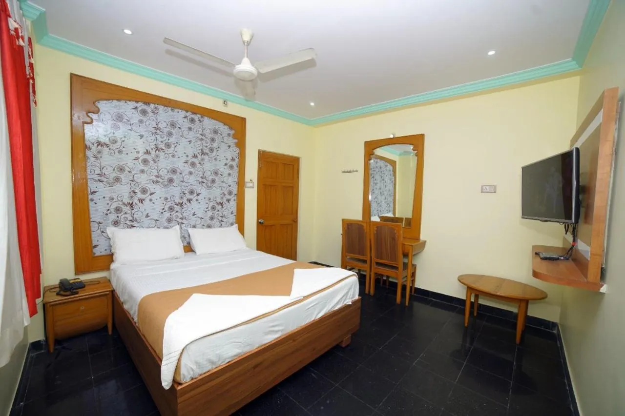 Bed in HOTEL ASWINI GRAND LODGE