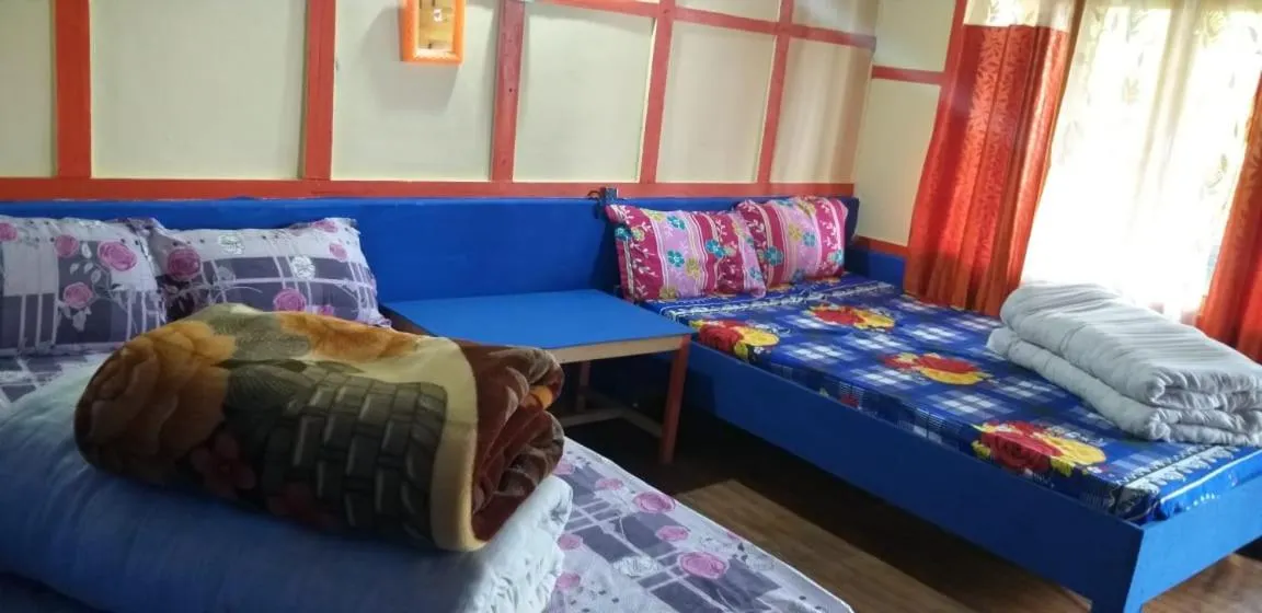Bed in Niru Homestay
