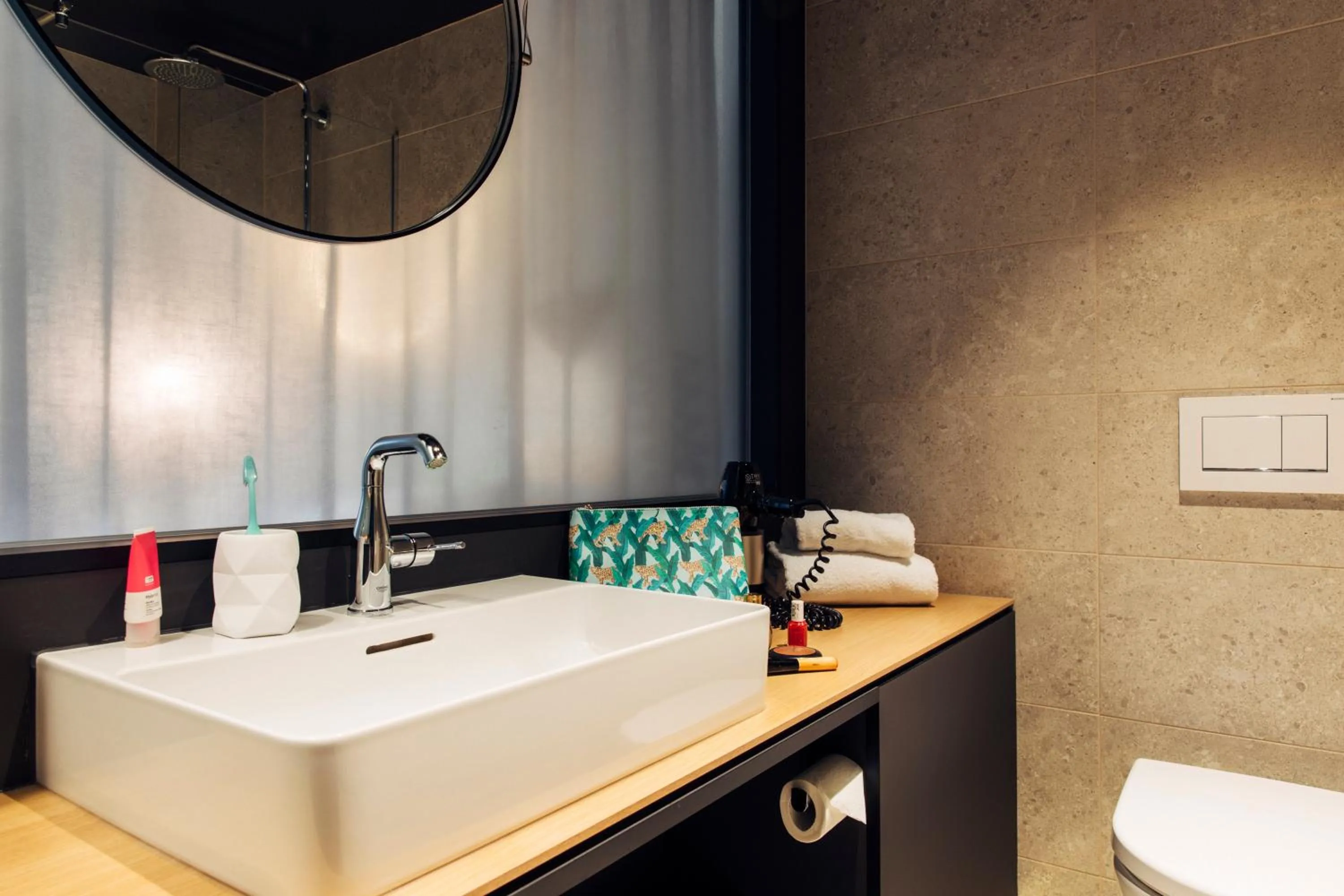 Bathroom in harry's home Bischofshofen hotel & apartments