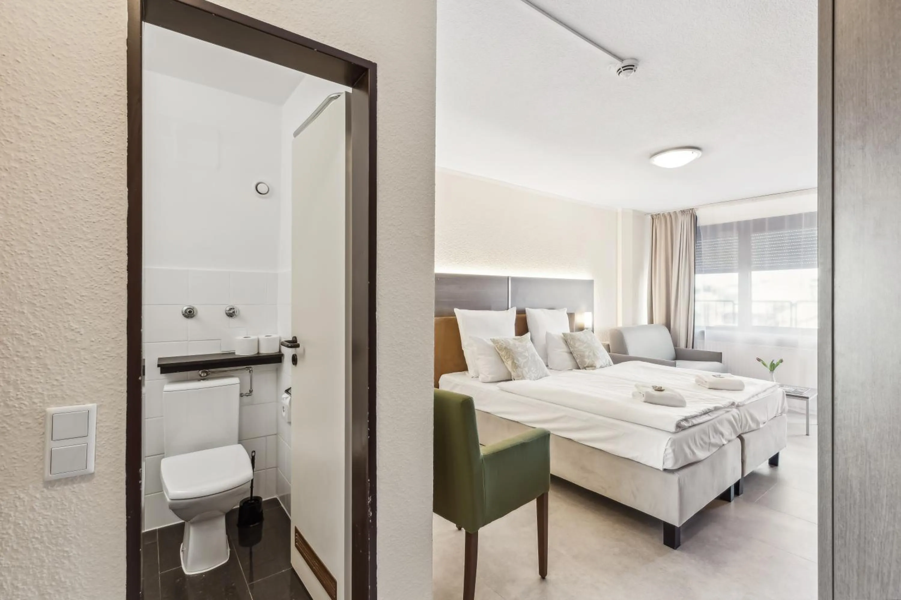 Bed in Cityhotel Amadeus