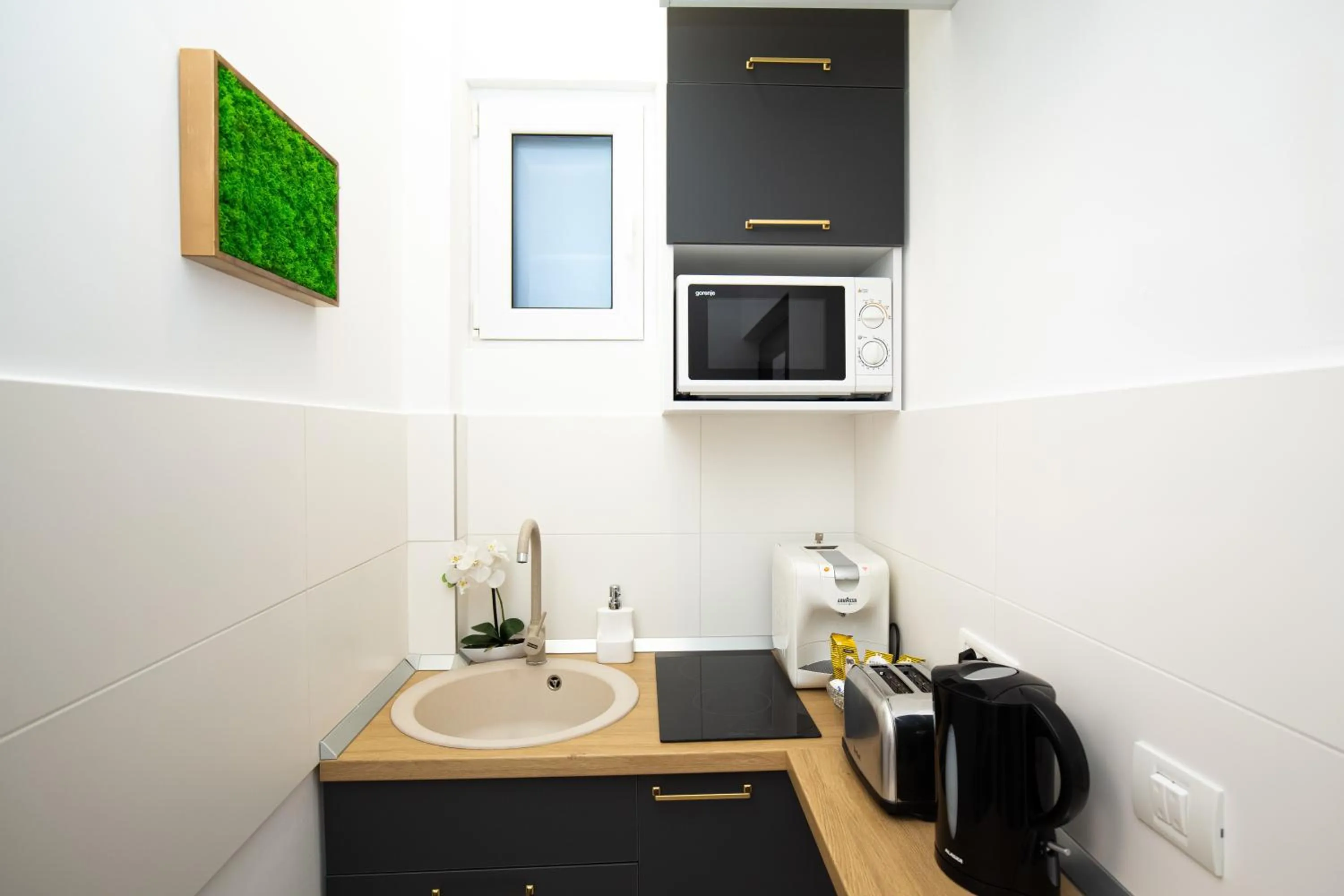 Kitchen or kitchenette in Metropole Apartments Studio Old City