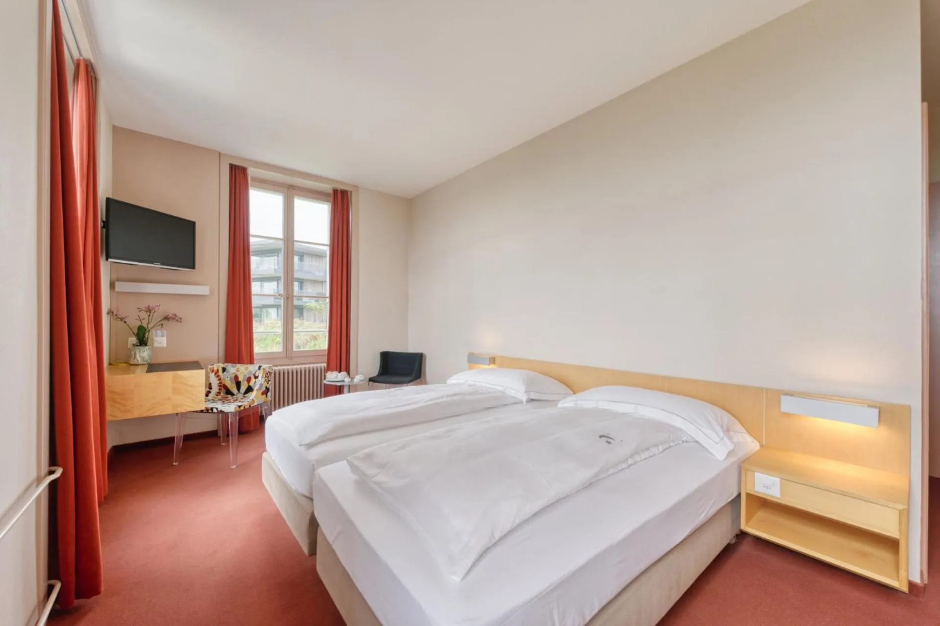 Bed in Hôtel Le Funi de Cossonay