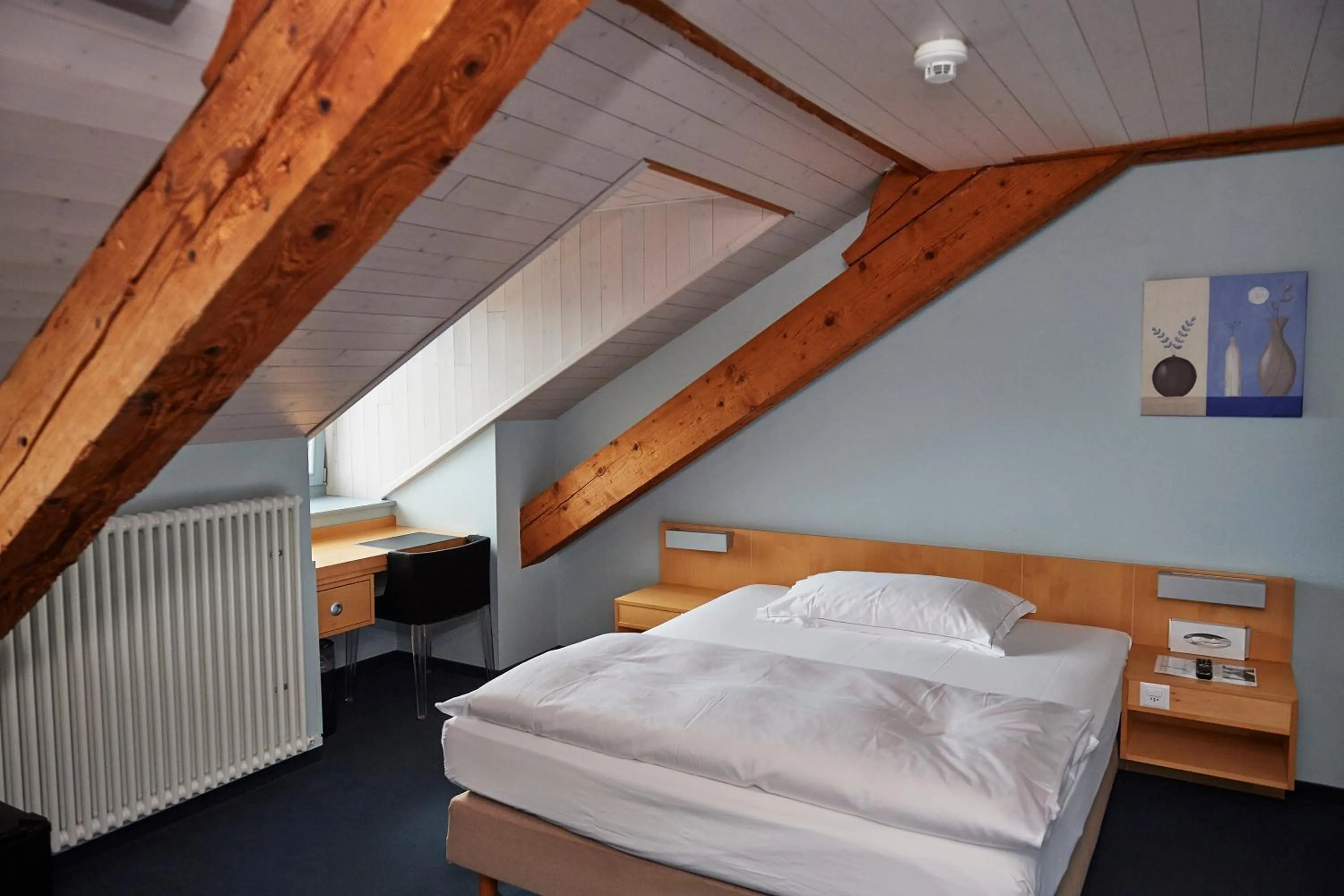 Bed in Hôtel Le Funi de Cossonay