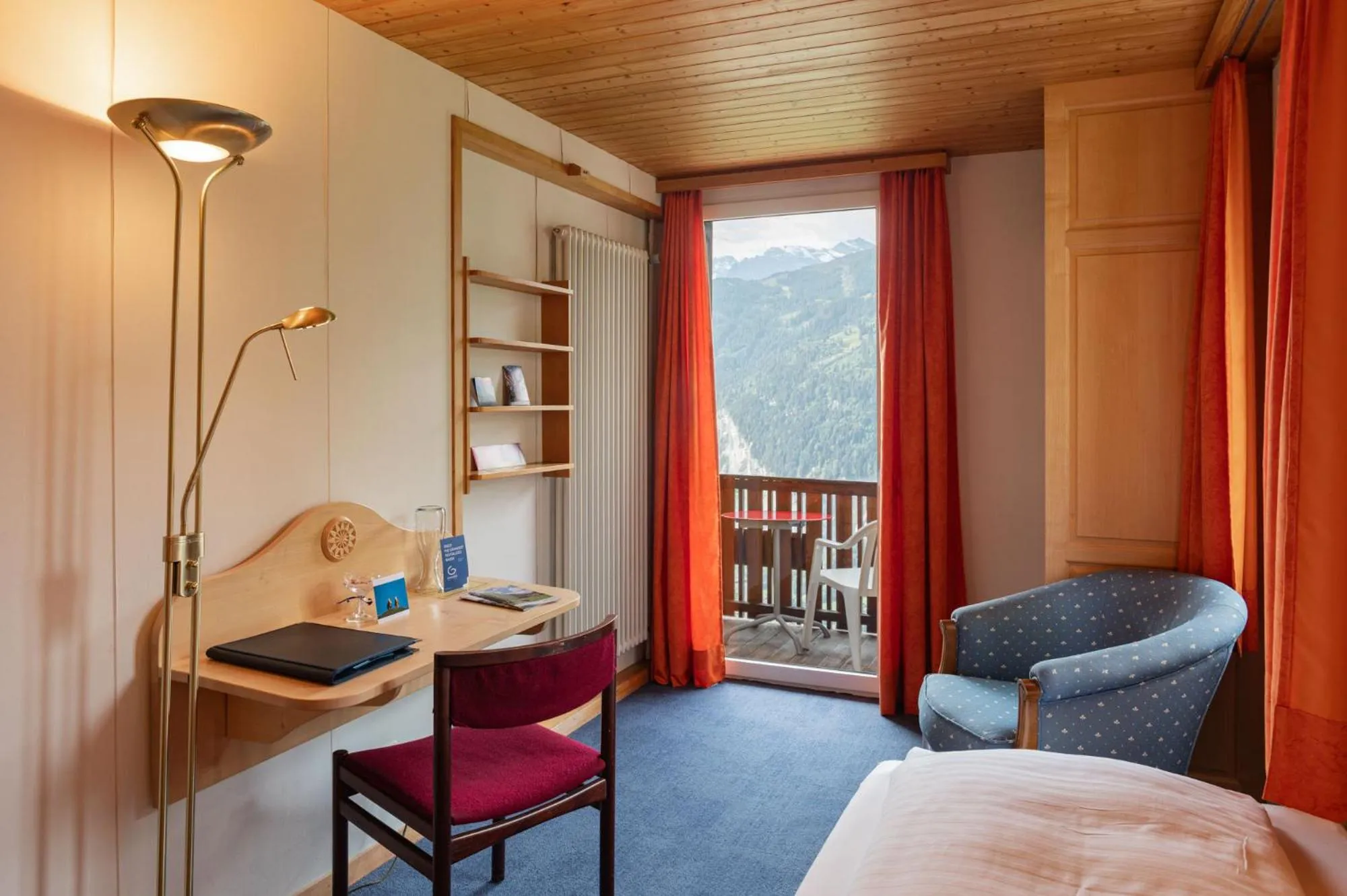 Bed in Hotel Bellevue - Traditional Swiss Hideaway