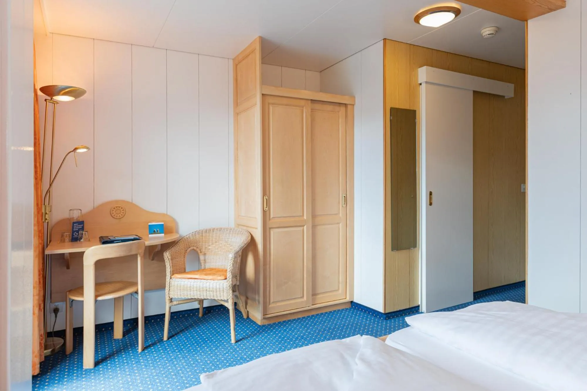 Bed in Hotel Bellevue - Traditional Swiss Hideaway