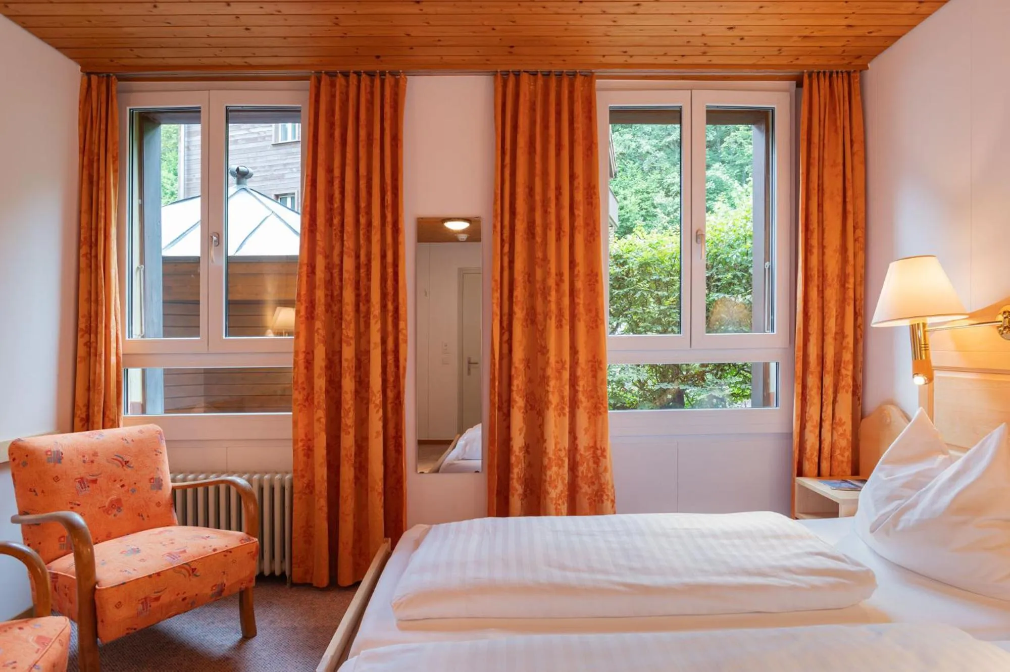 Bed in Hotel Bellevue - Traditional Swiss Hideaway