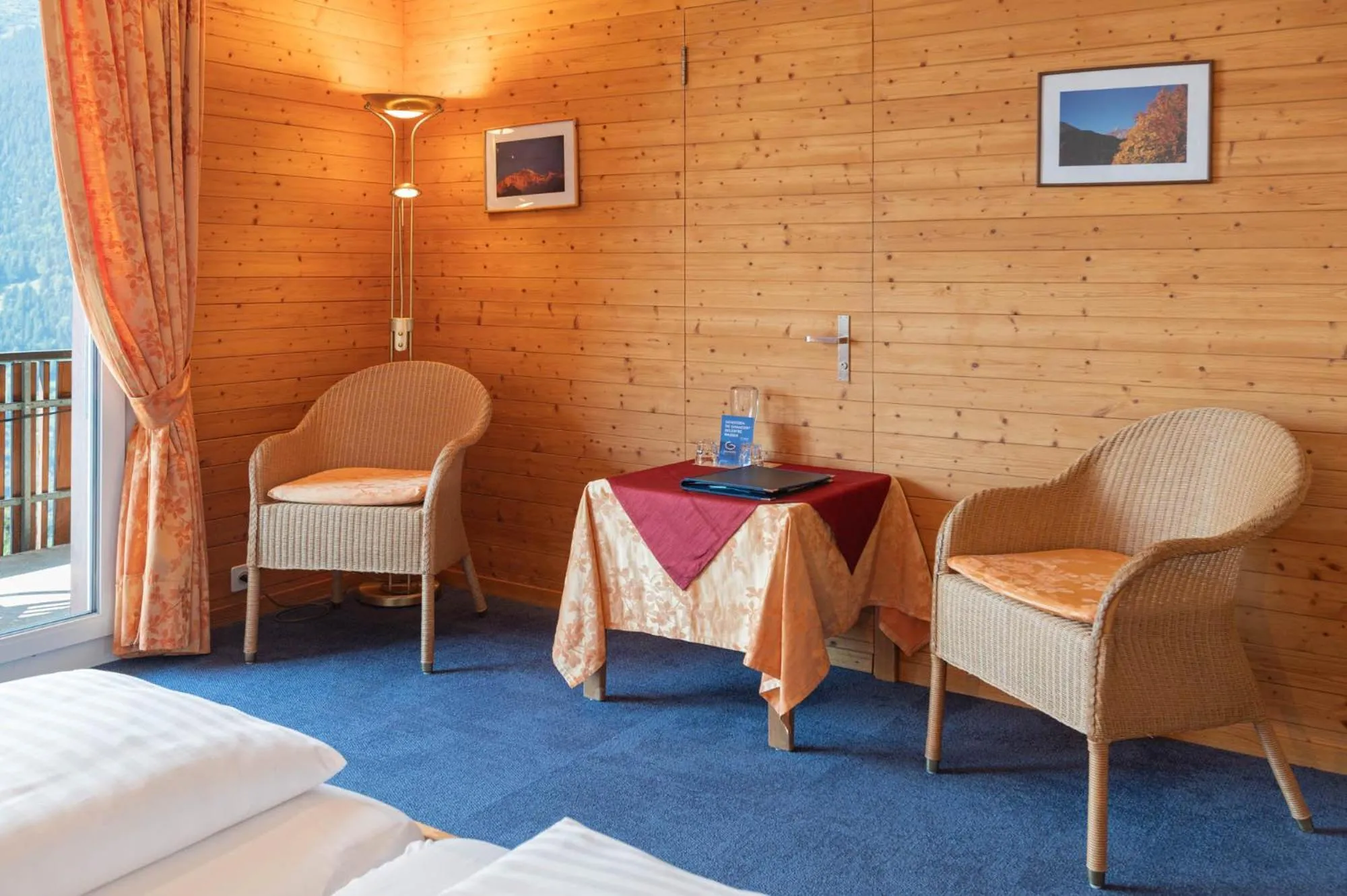 Bed in Hotel Bellevue - Traditional Swiss Hideaway