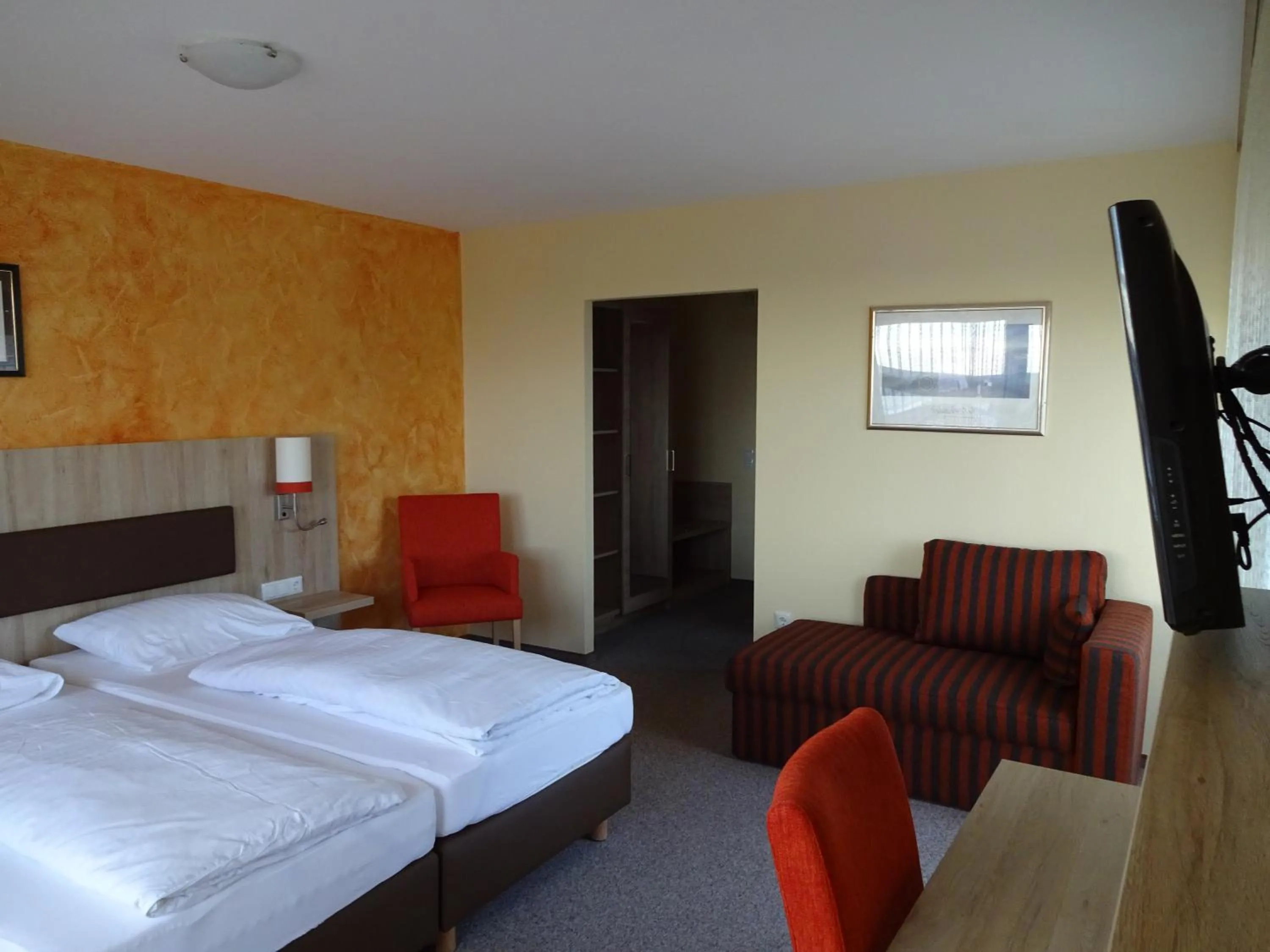 Photo of the whole room, Bed in Gasthof Hotel Zum Ross