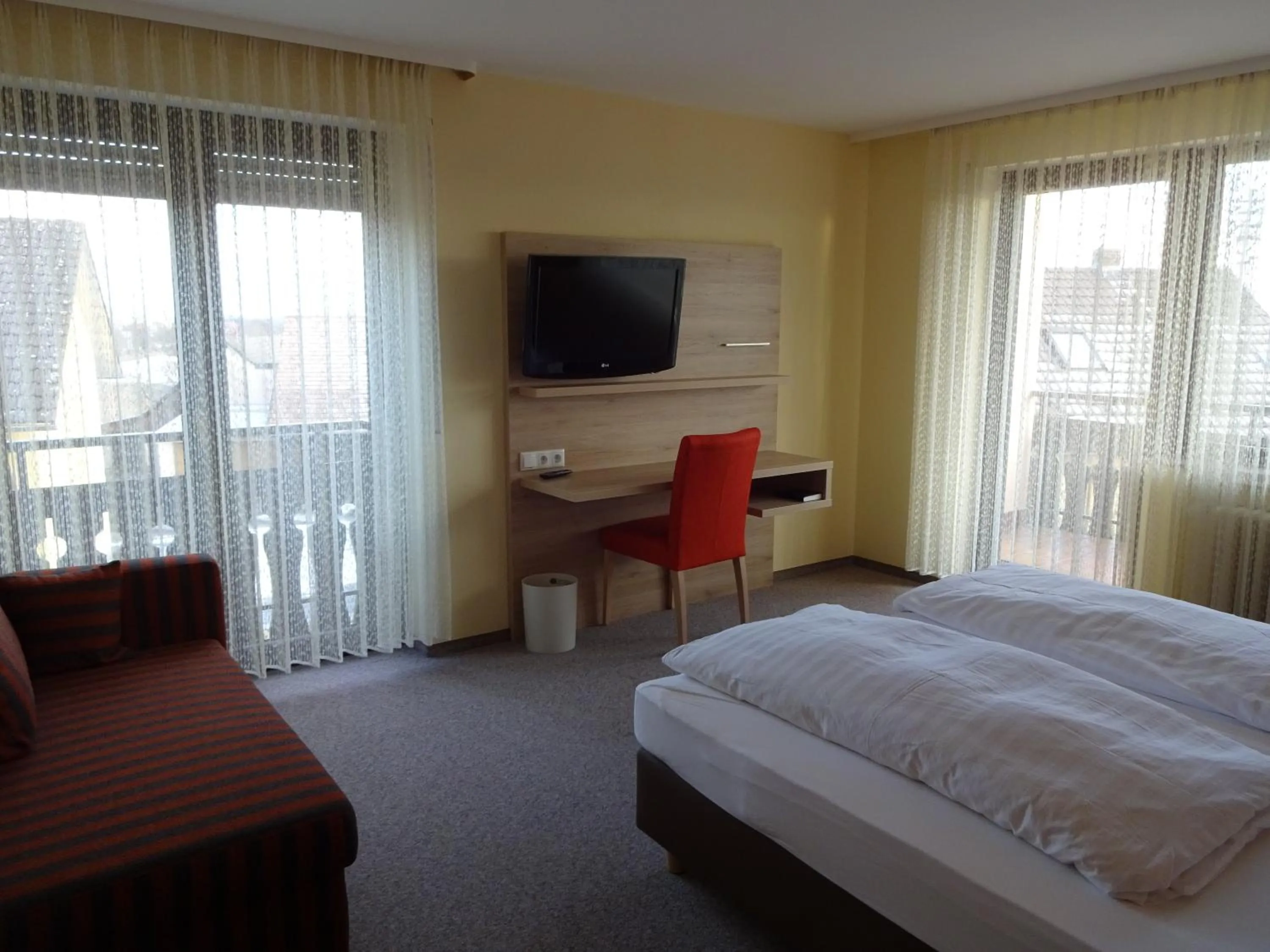 Photo of the whole room, Bed in Gasthof Hotel Zum Ross