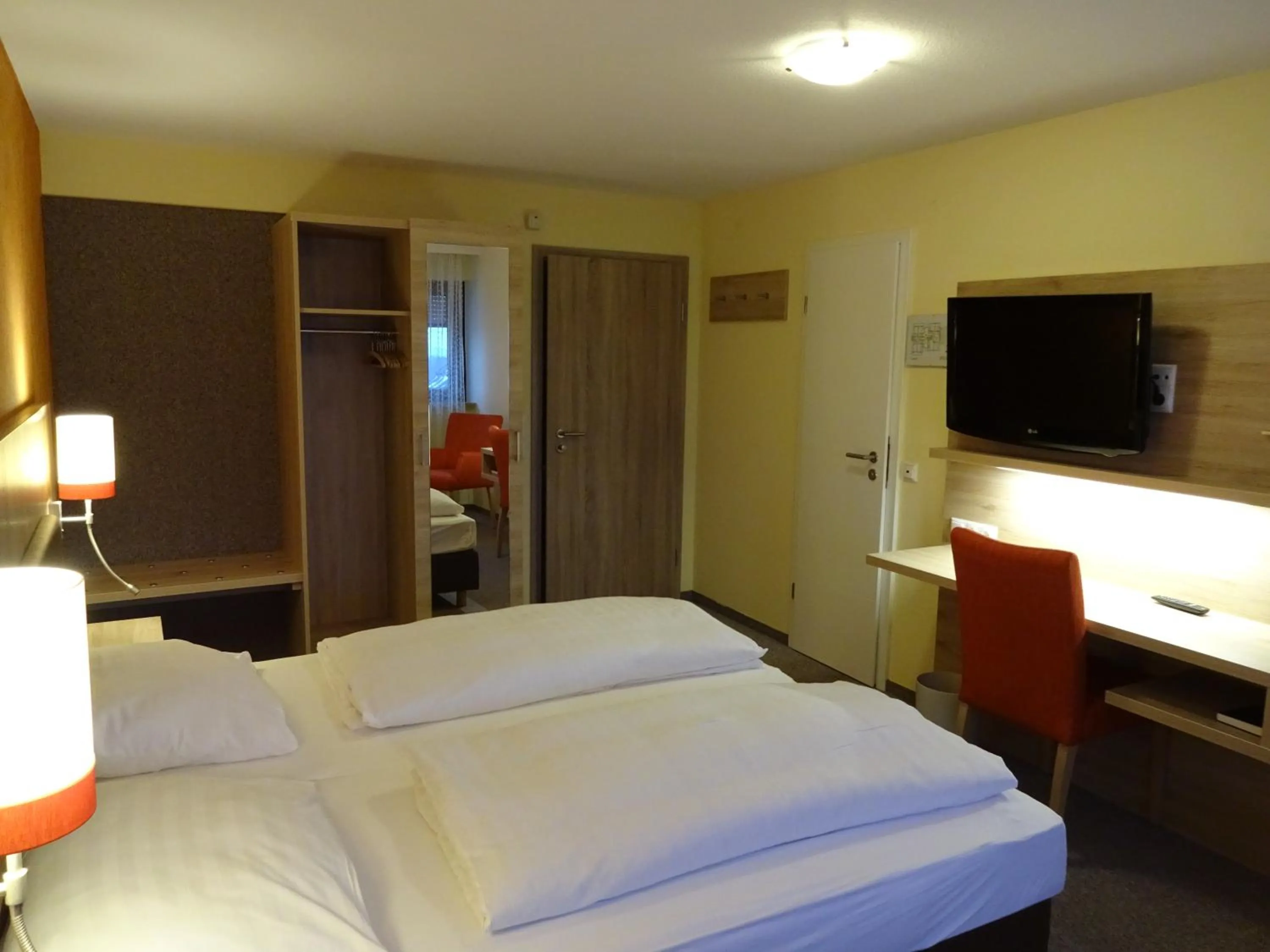 Photo of the whole room, Bed in Gasthof Hotel Zum Ross
