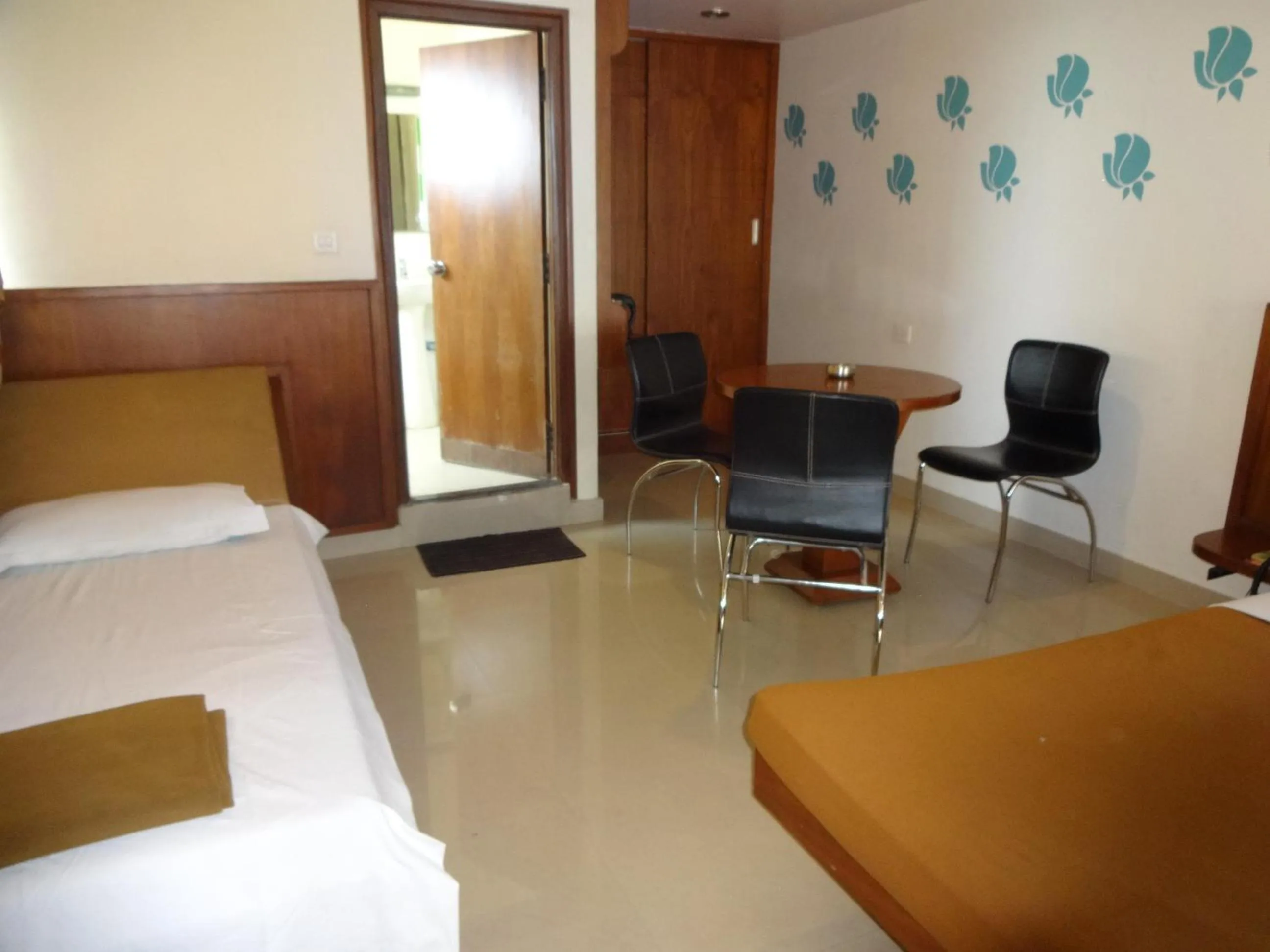 Photo of the whole room, Bed in Sheetal Residency