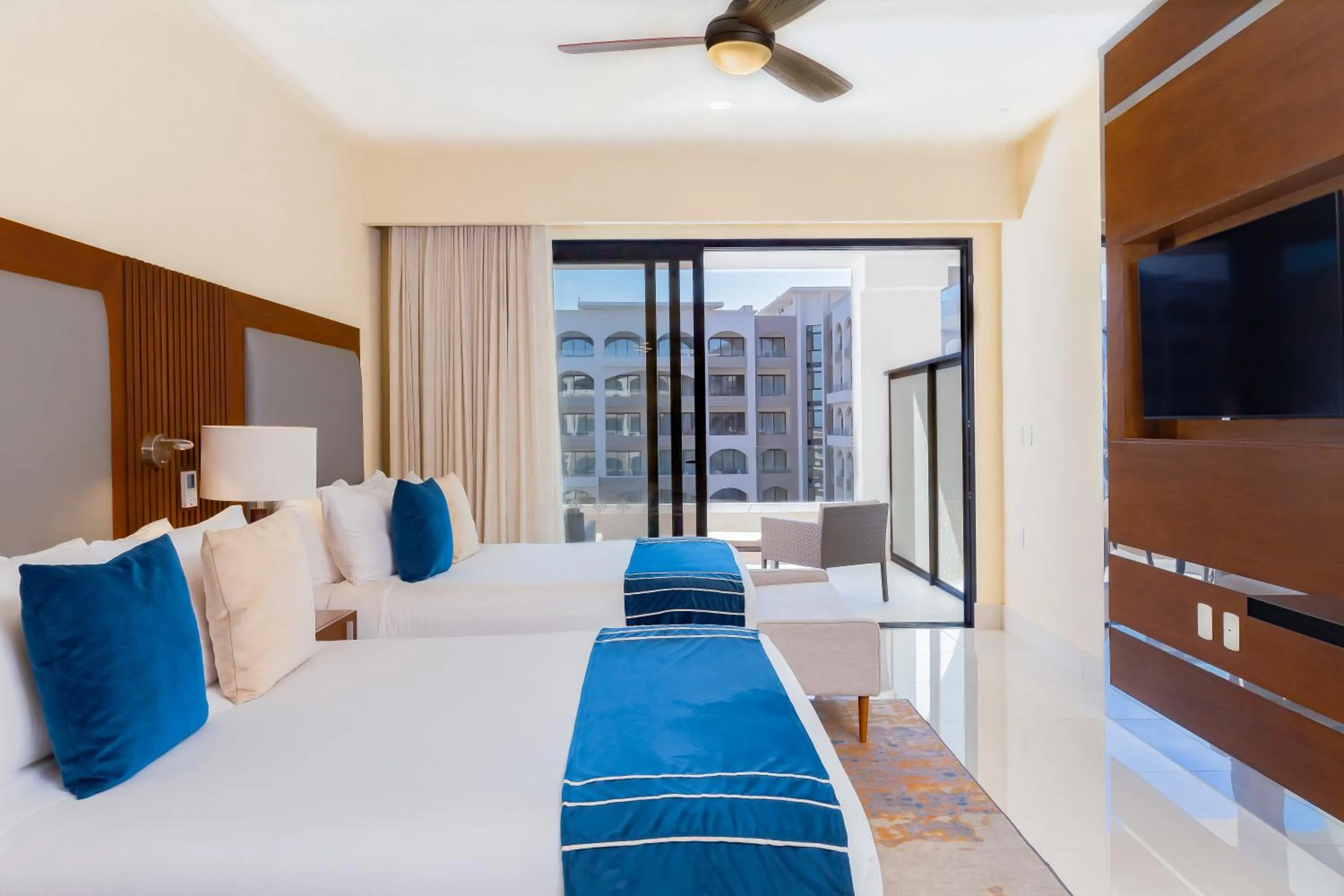 Bed in Villa La Valencia Beach Resort & Spa Los Cabos