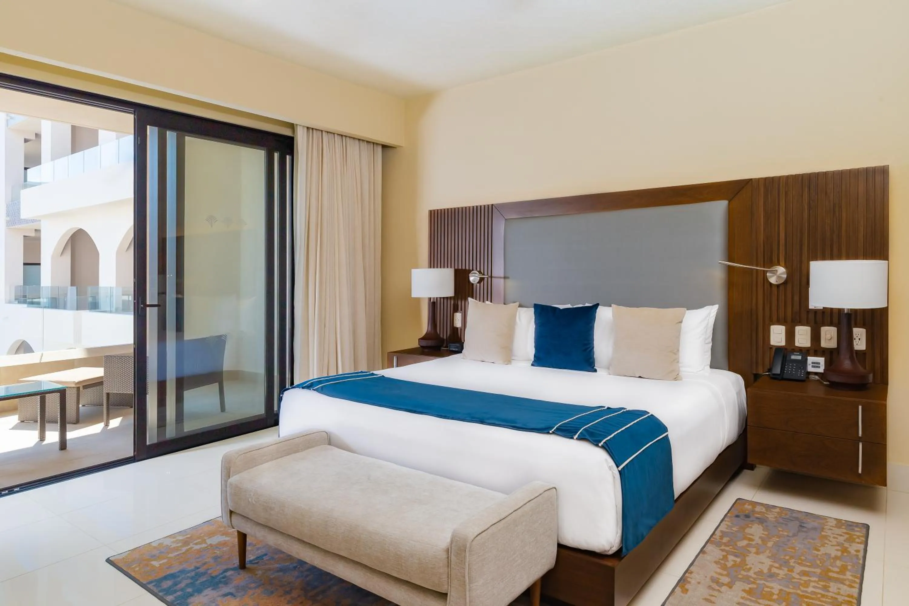 Bed in Villa La Valencia Beach Resort & Spa Los Cabos