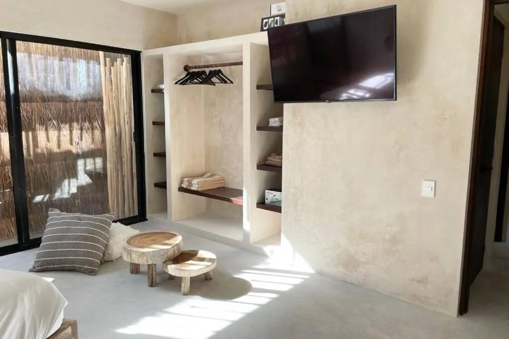 Bed in Tulum Apartment Boho Vibes