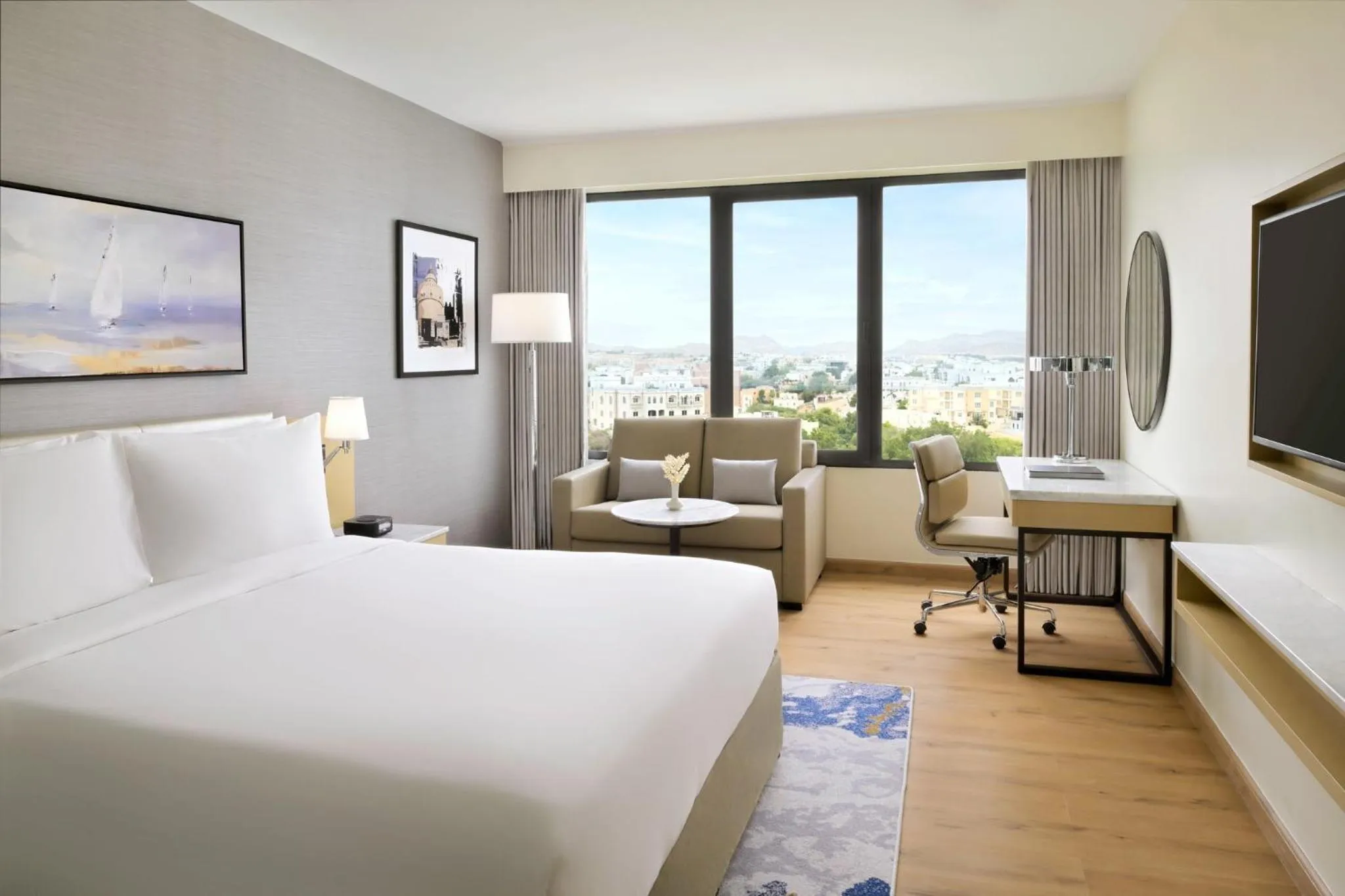 Photo of the whole room, Bed in Crowne Plaza Muscat by IHG