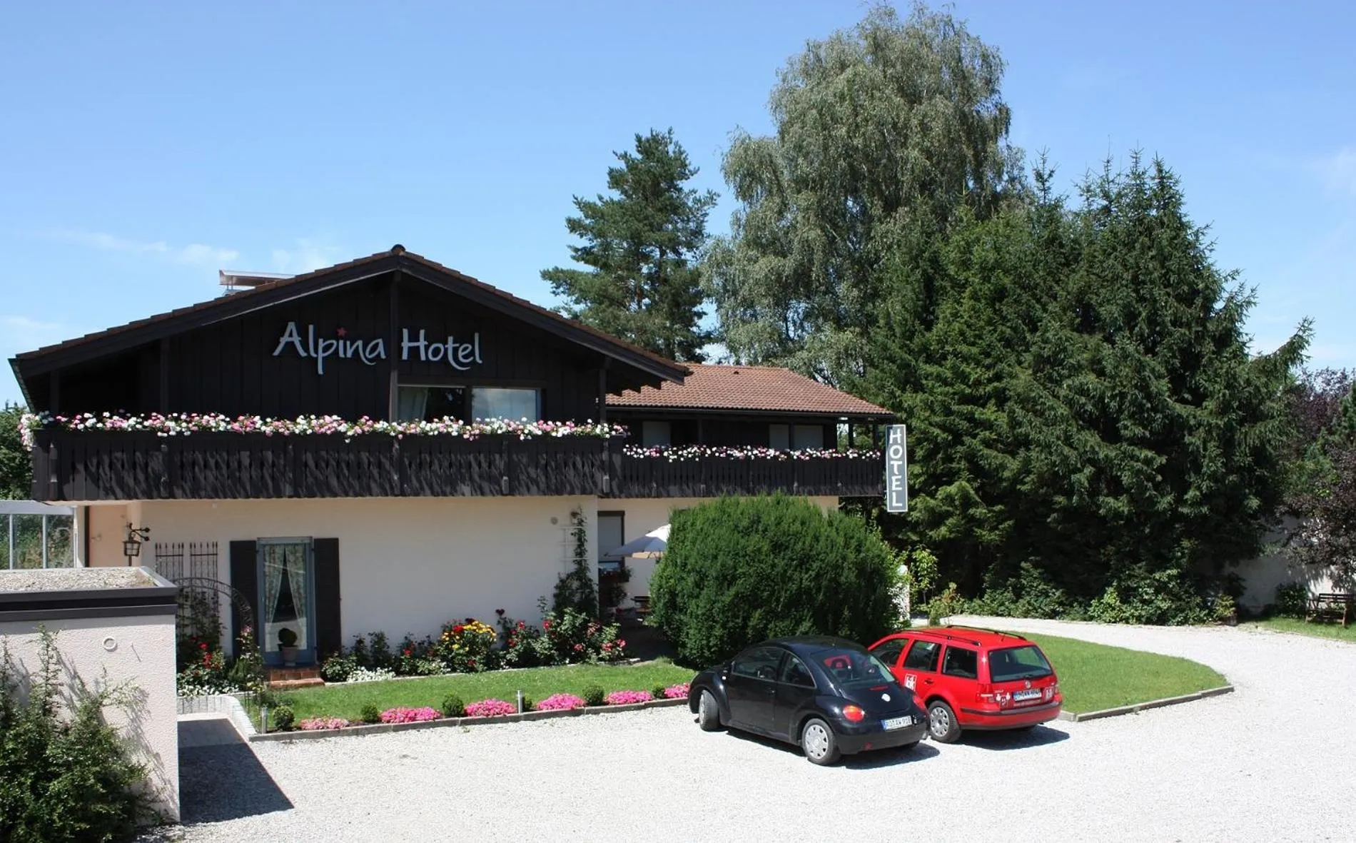Facade/entrance in Alpina Hotel