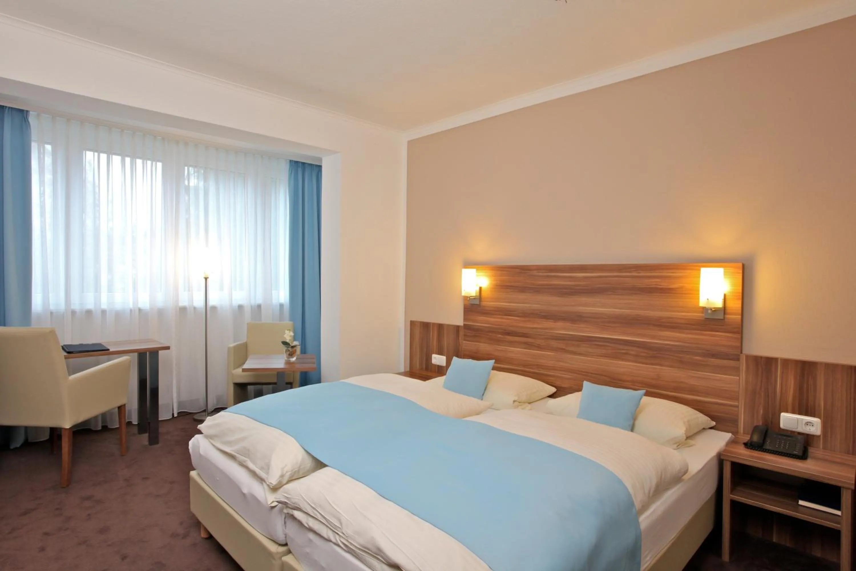 Photo of the whole room, Bed in Waldhotel Bad Soden