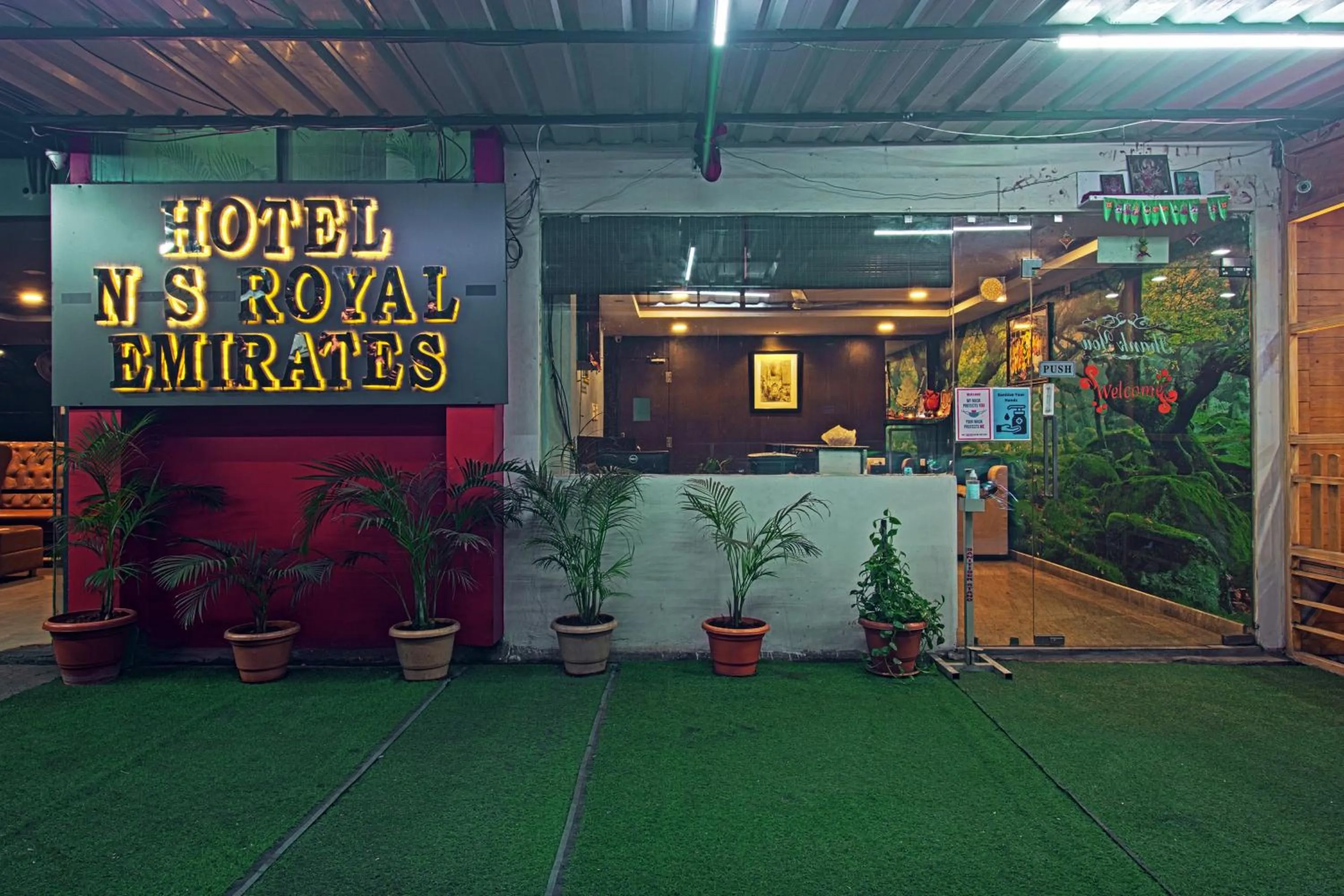 Property logo or sign in Hotel NS Royal Emirates With 3Hr Early check in