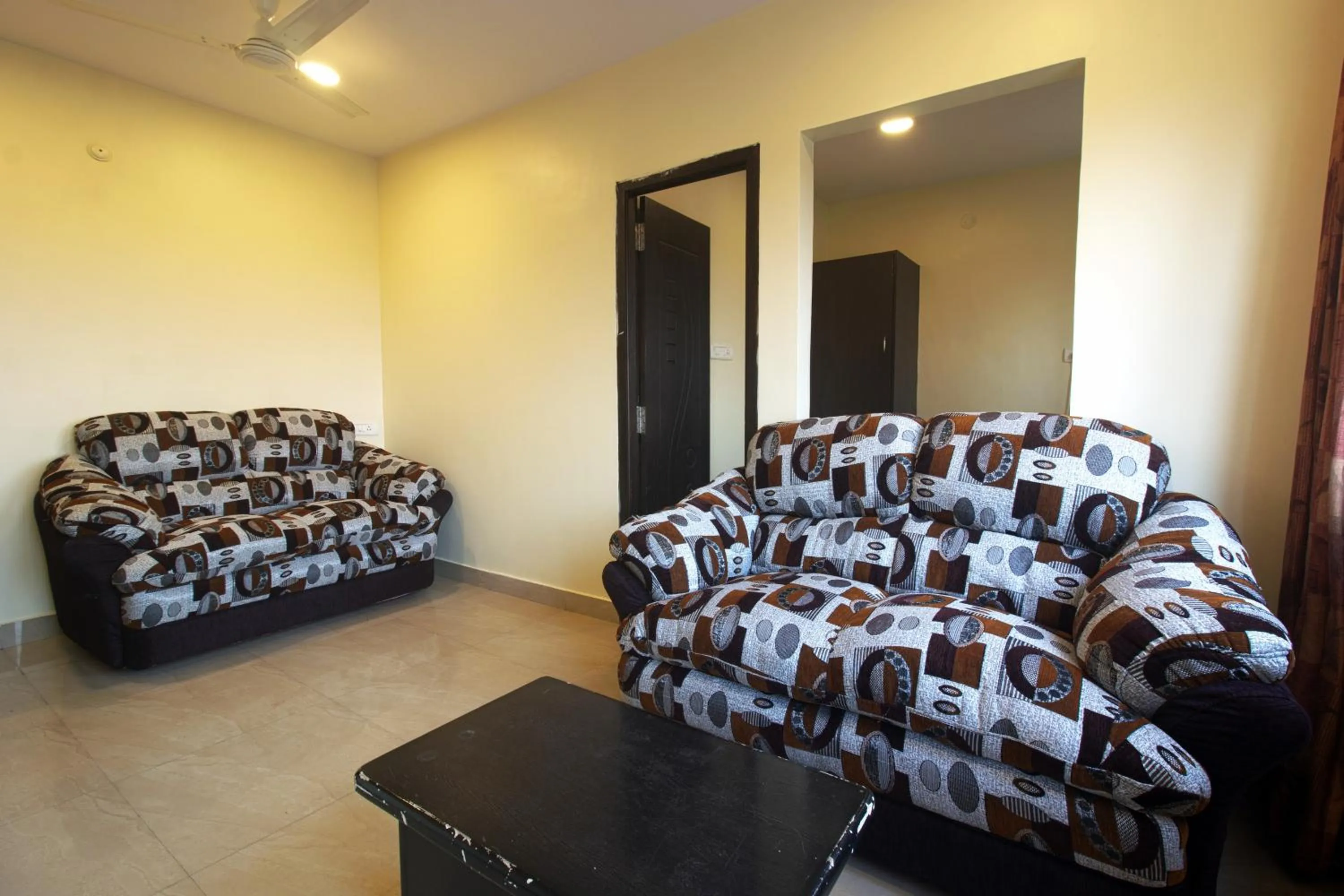 Seating area in Hotel NS Royal Emirates With 3Hr Early check in