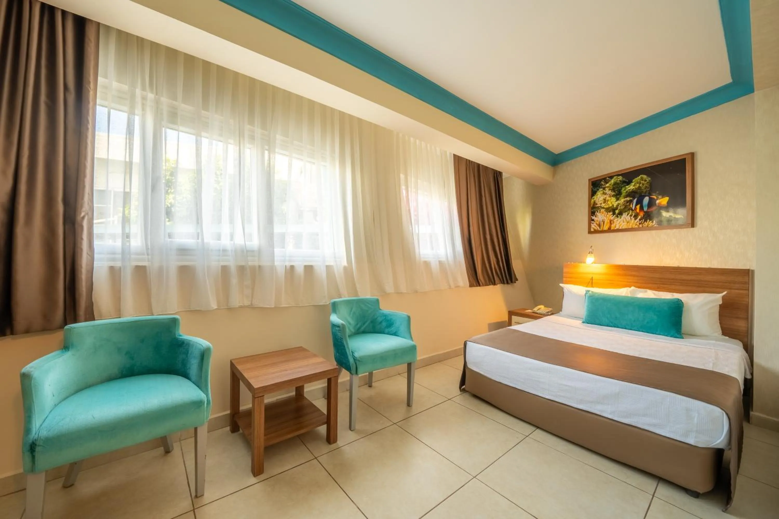 Seating area, Bed in Miarosa Kemer Beach