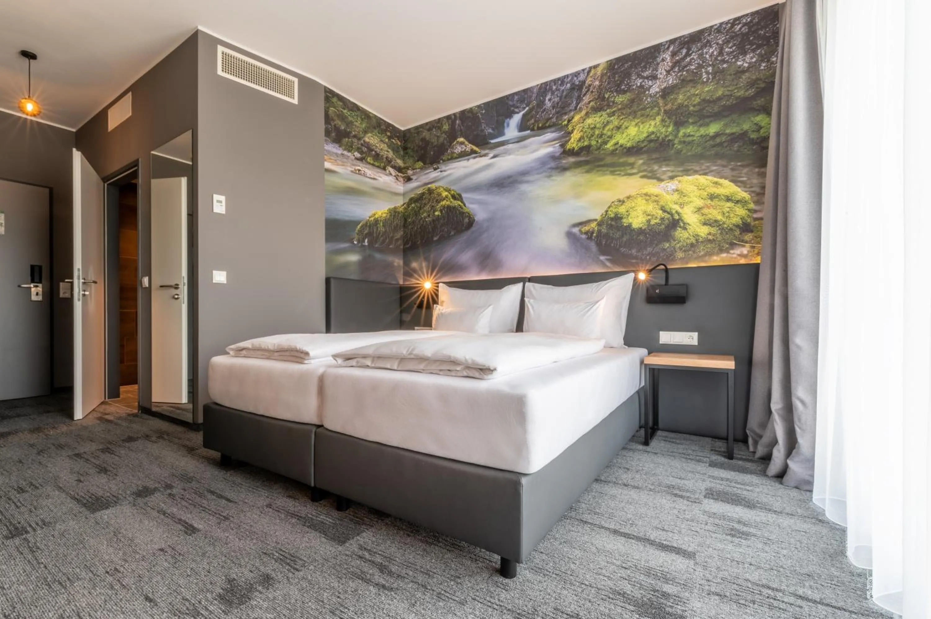 Photo of the whole room, Bed in Aiden by Best Western Stadtgut Hotel Steyr - FREE PARKING