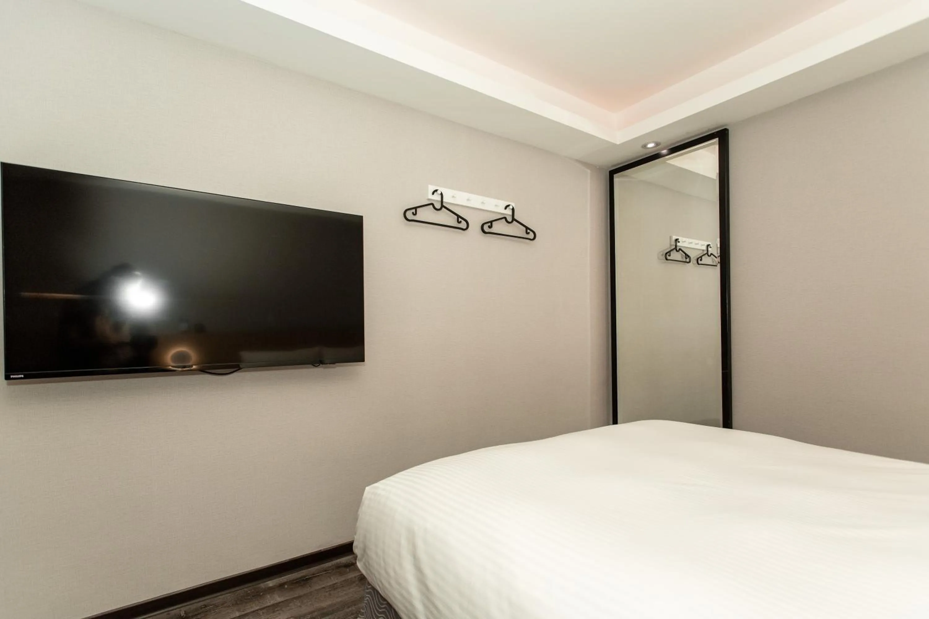 Bed in HUB HOTEL Tucheng