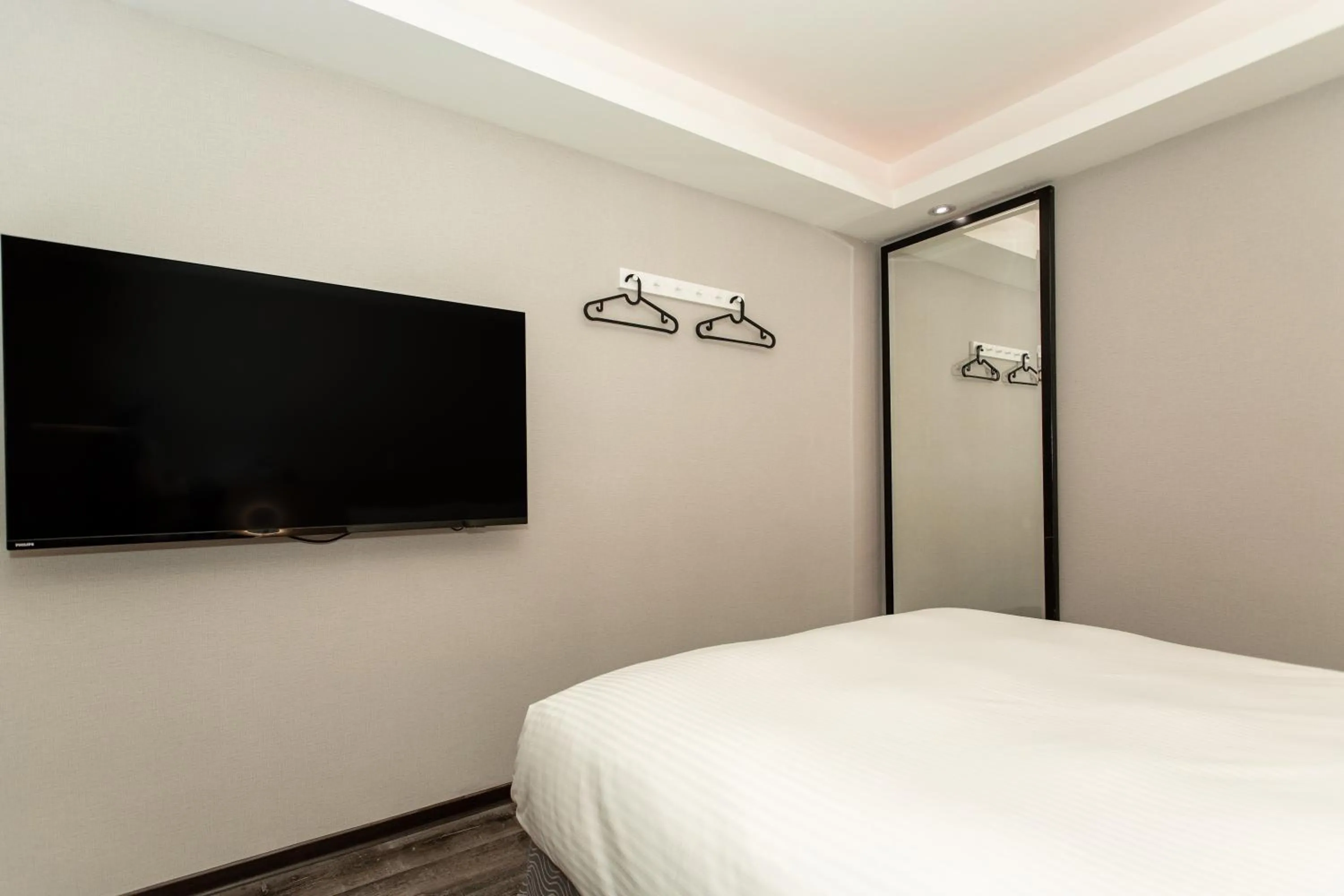 Bed in HUB HOTEL Tucheng