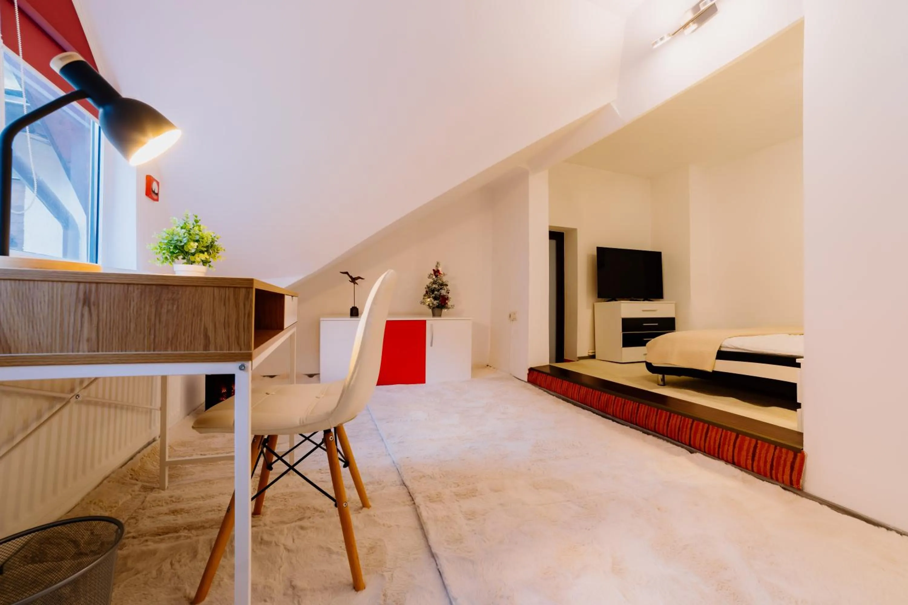 Bedroom in ALBERT RESIDENCE Brasov with complimentary parking and 10 percent Food and Drinks