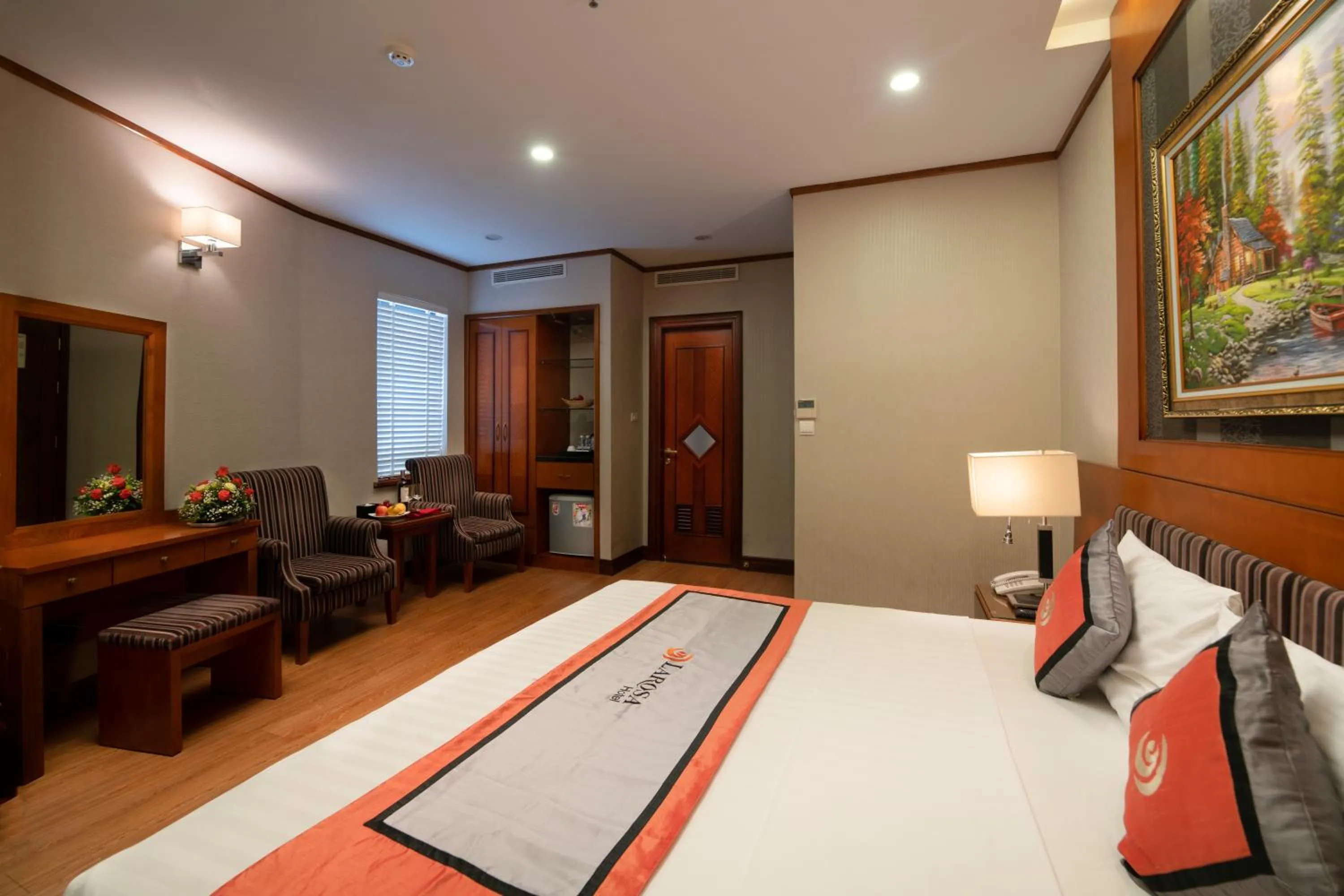 Living room, Bed in Hanoi Larosa Hotel