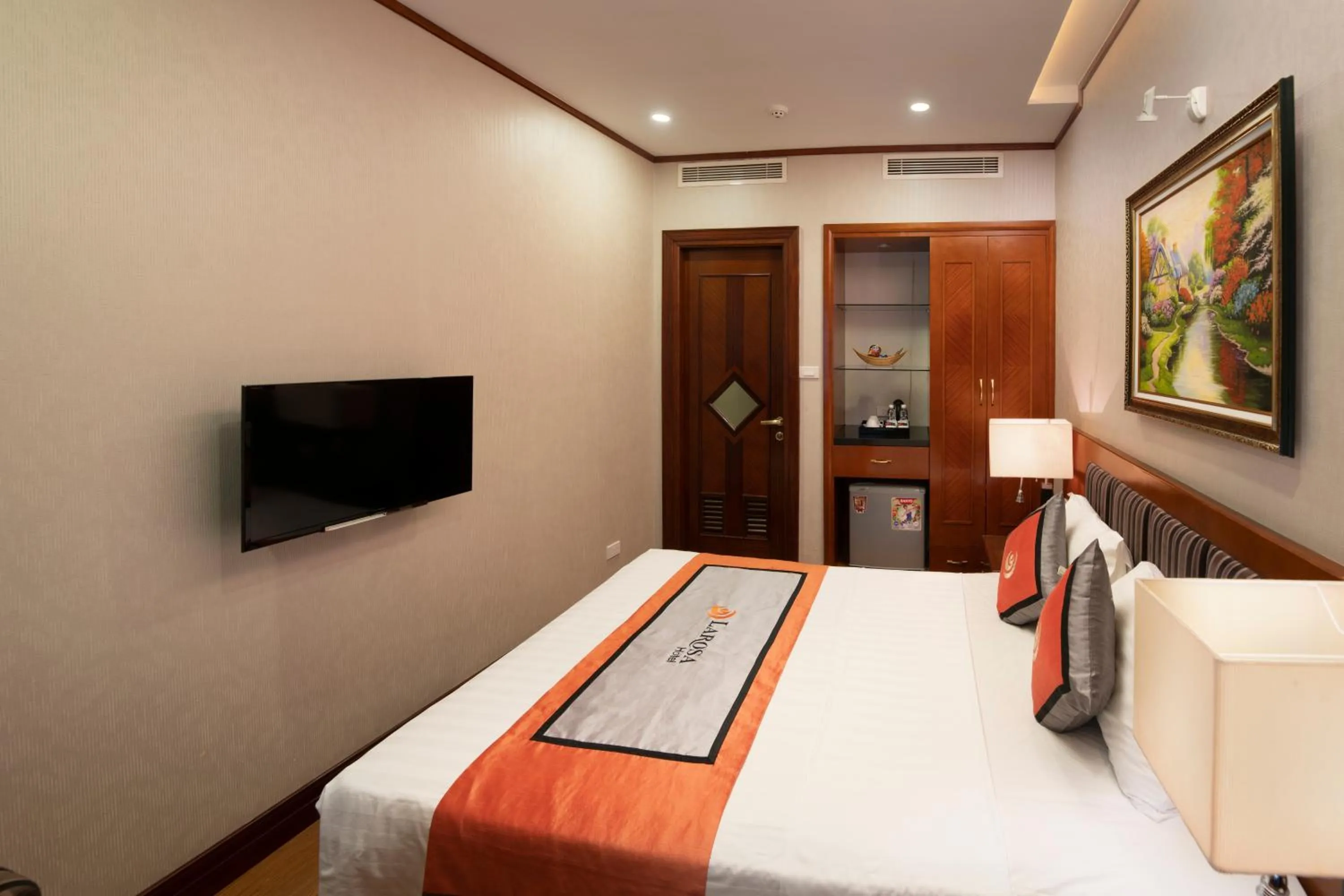 Photo of the whole room, Bed in Hanoi Larosa Hotel