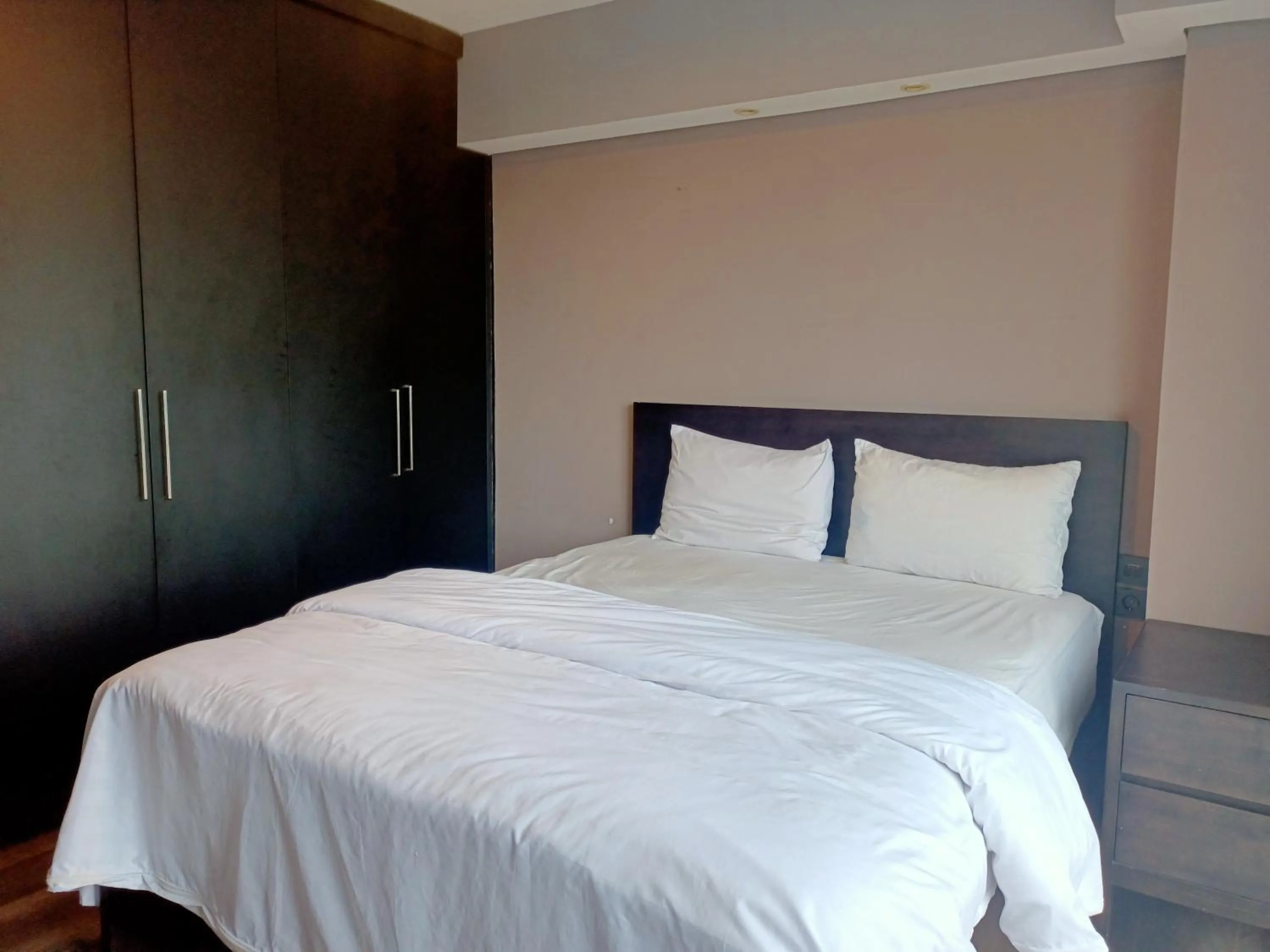 Bed in Cozy The H Residence Cawang by Bonzela Property