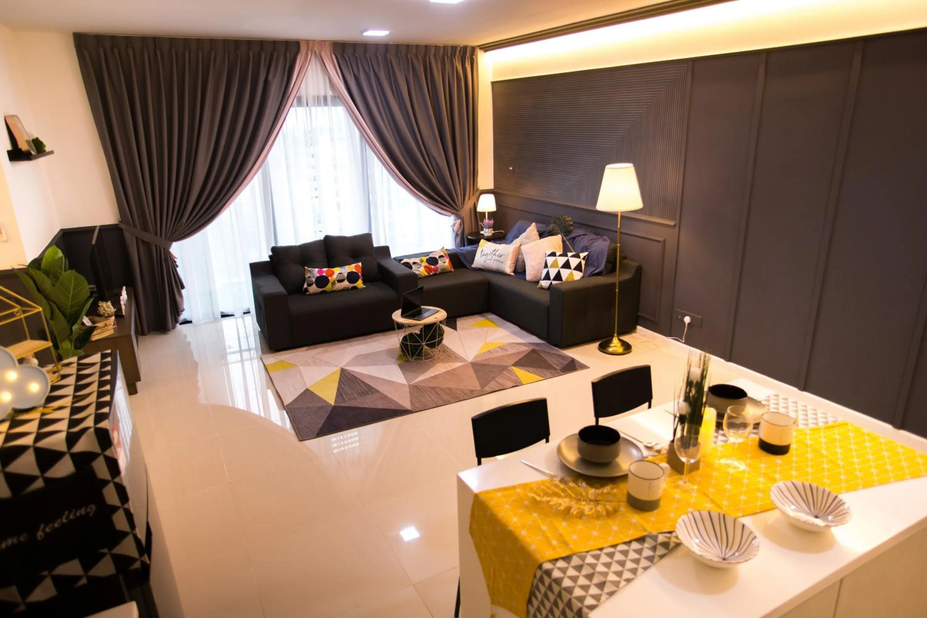 Living room in Suasana suites By The one