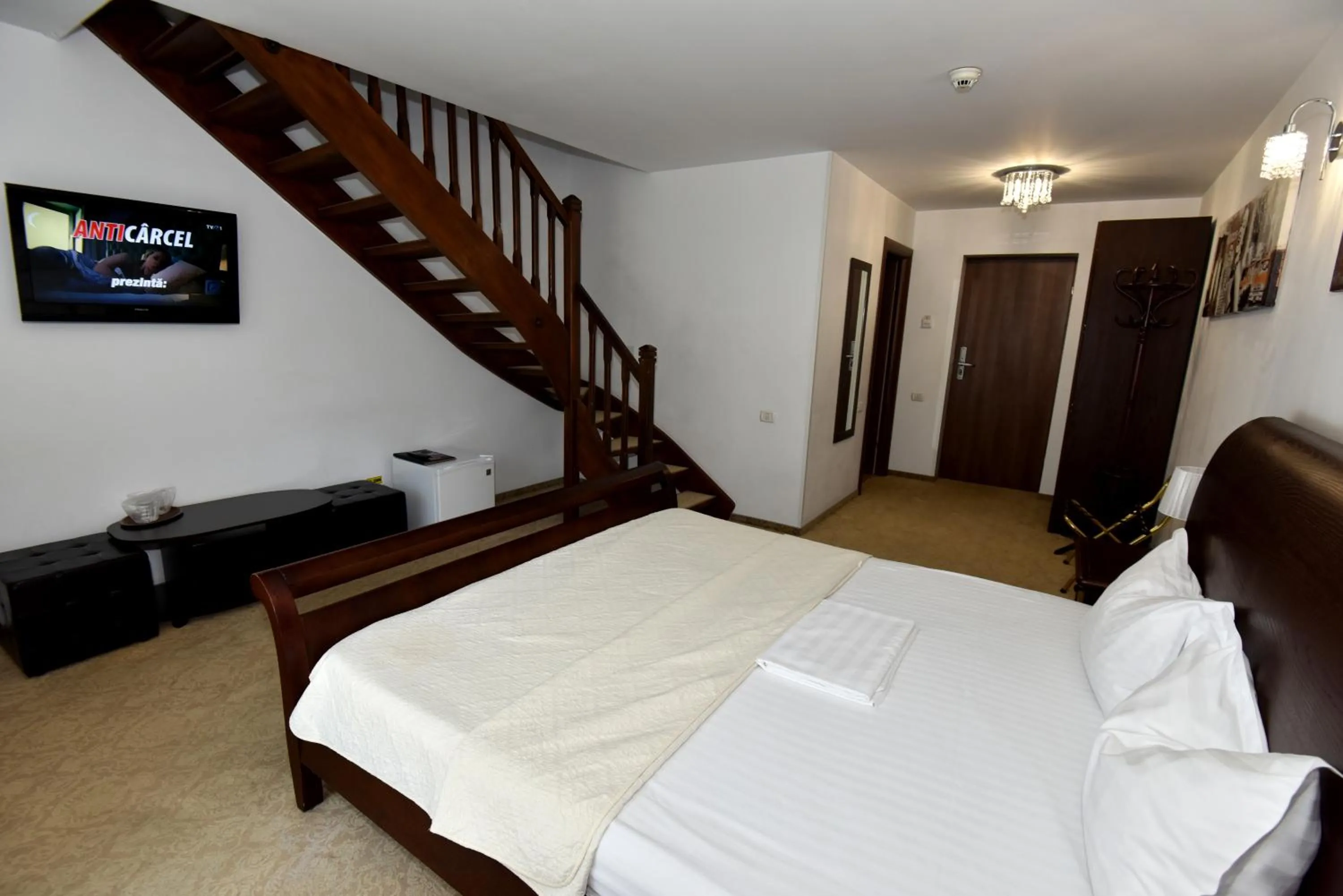 Communal lounge/ TV room, Bed in Conac Bavaria