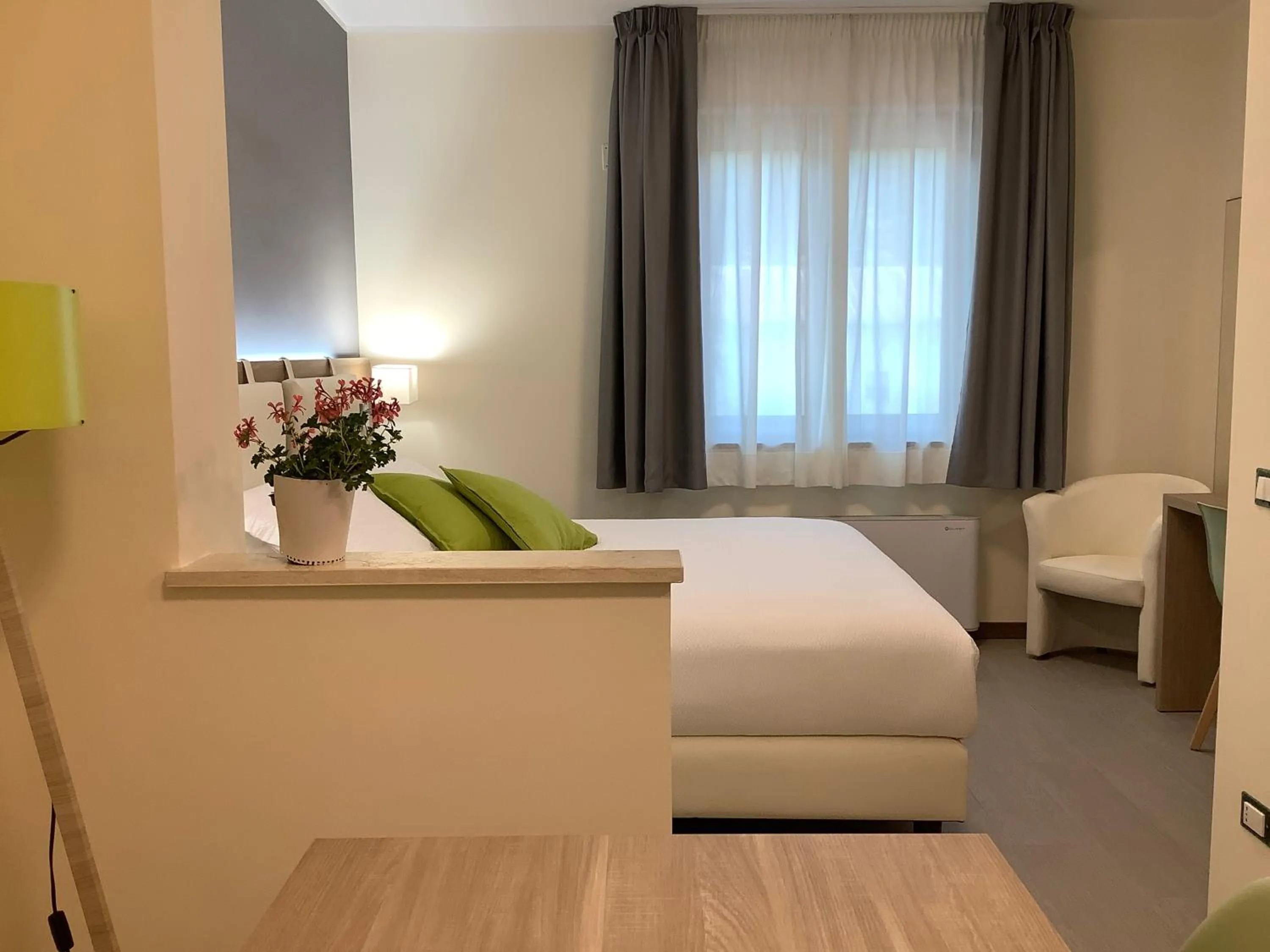 Living room, Bed in Arvo Residence Sila Lorica