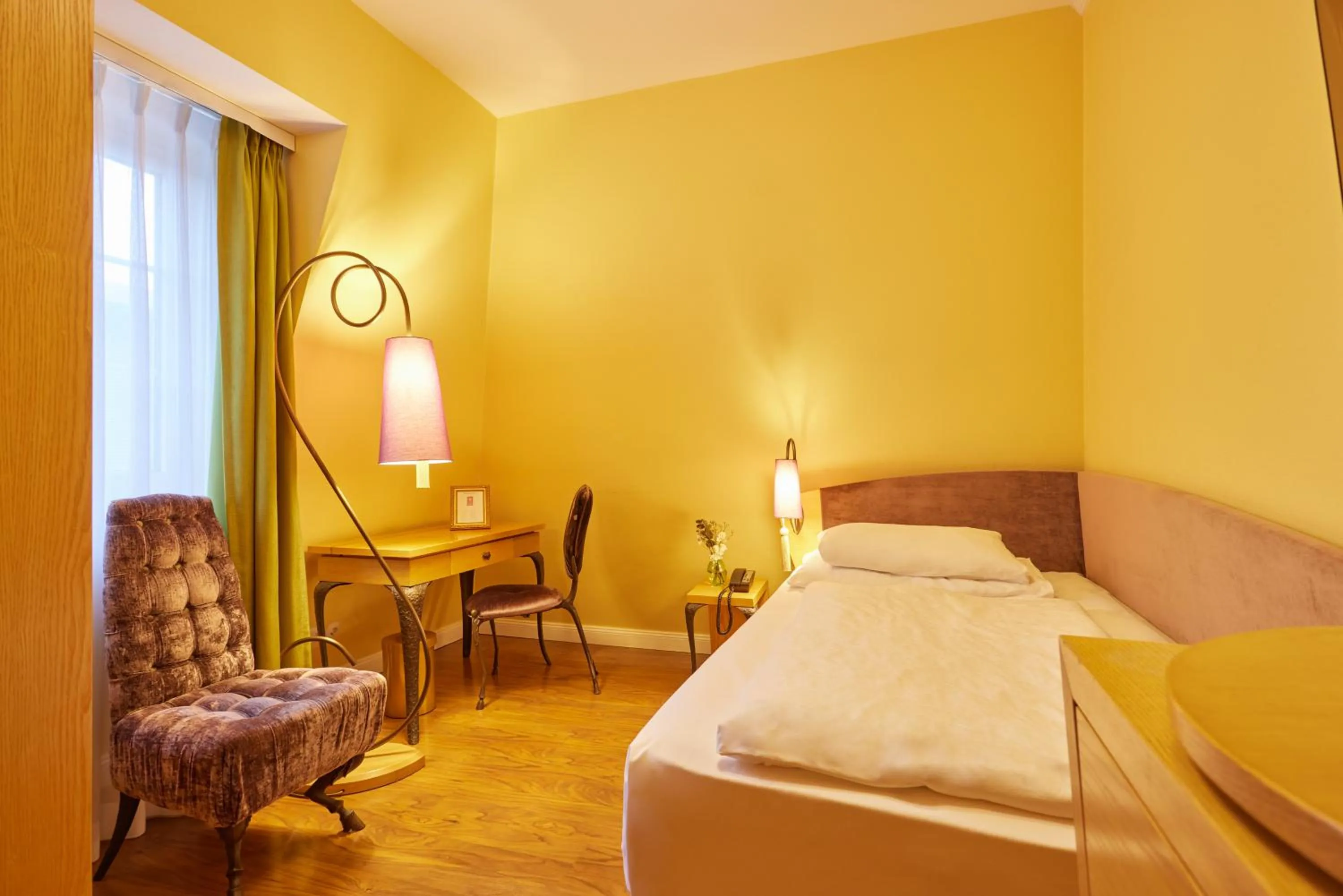 Bed in Classic Hotel Harmonie