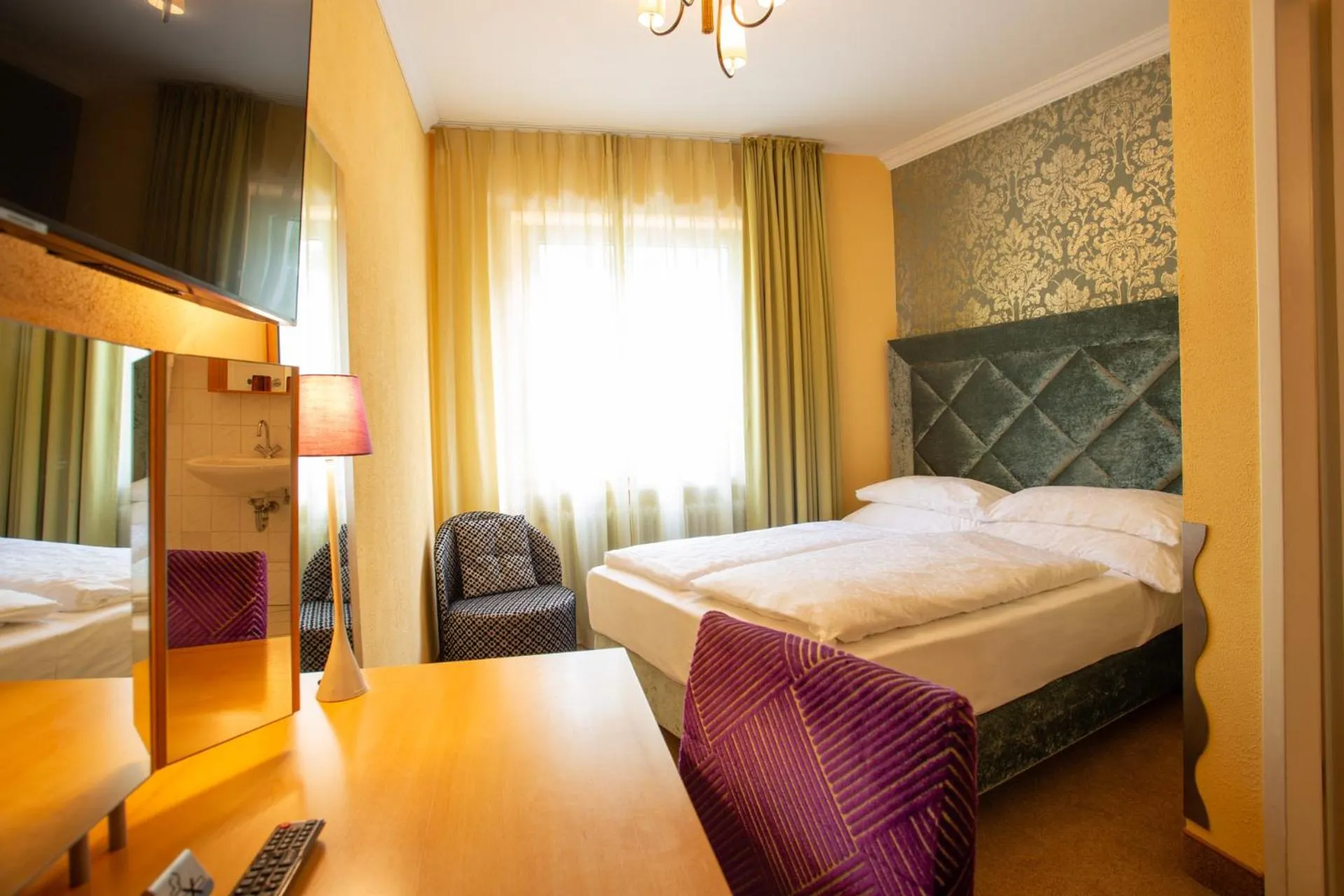 Photo of the whole room, Bed in Classic Hotel Harmonie